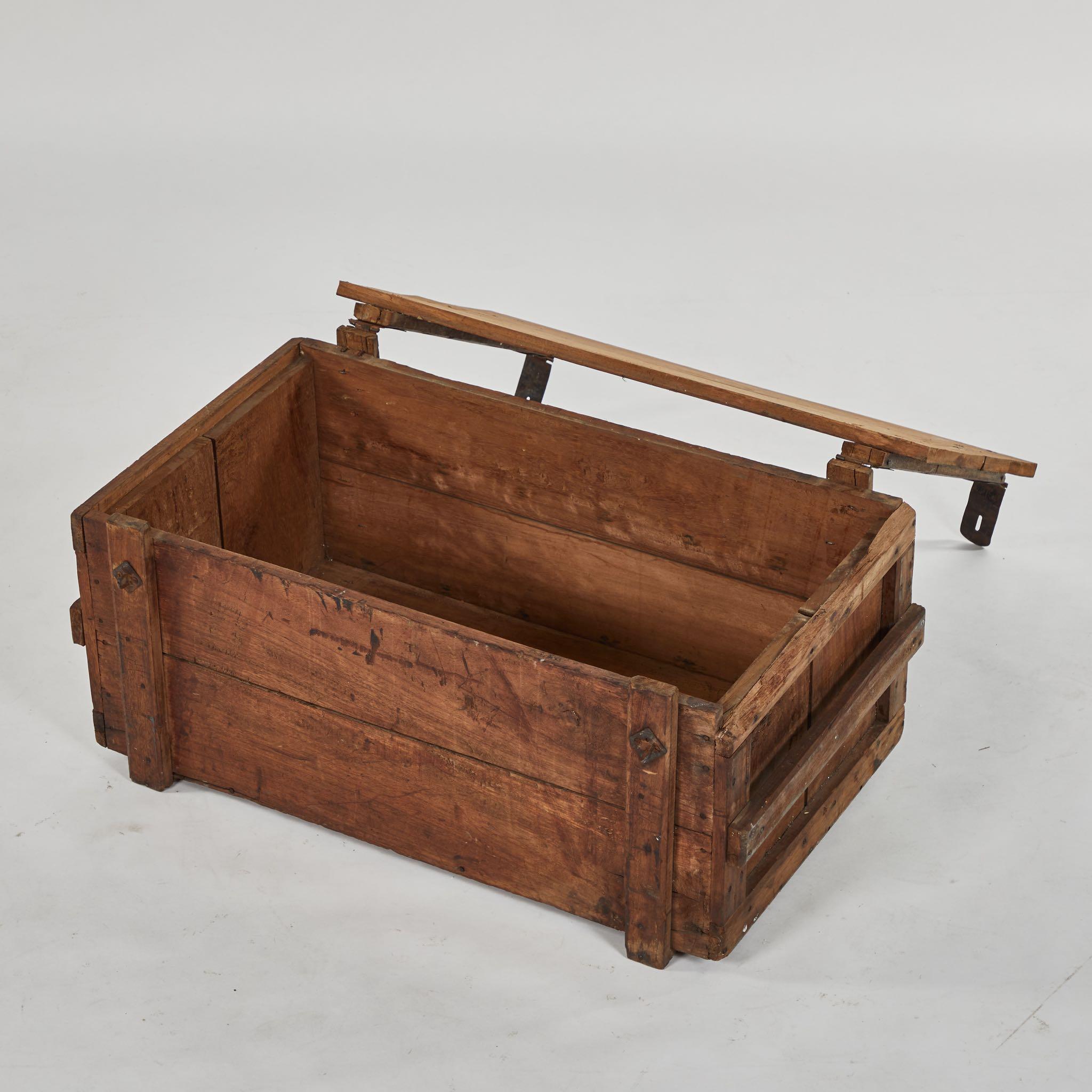 A rustic chest as a coffee table, originating in England, circa 1890.