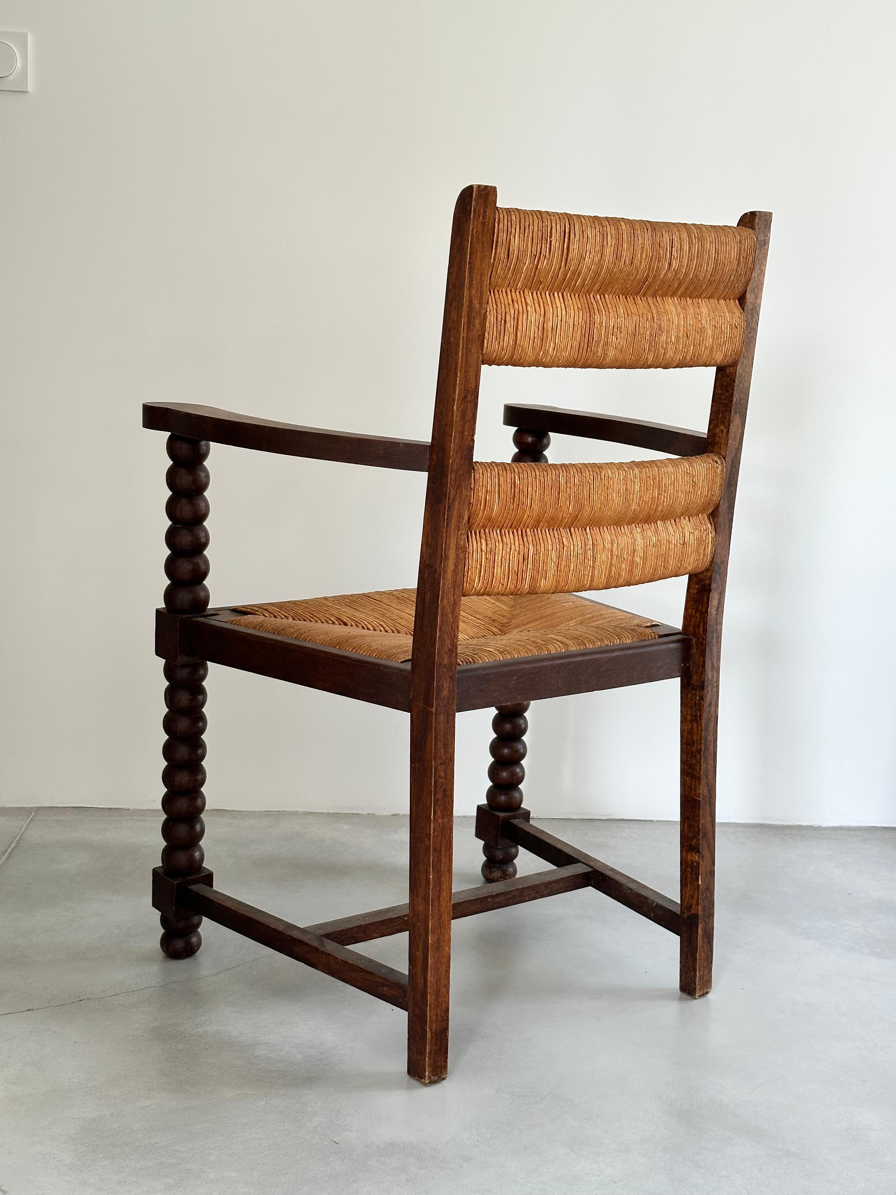 Rustic chic armchair, stained oak, straw, Charles Dudouyt style, France 1950s For Sale 6