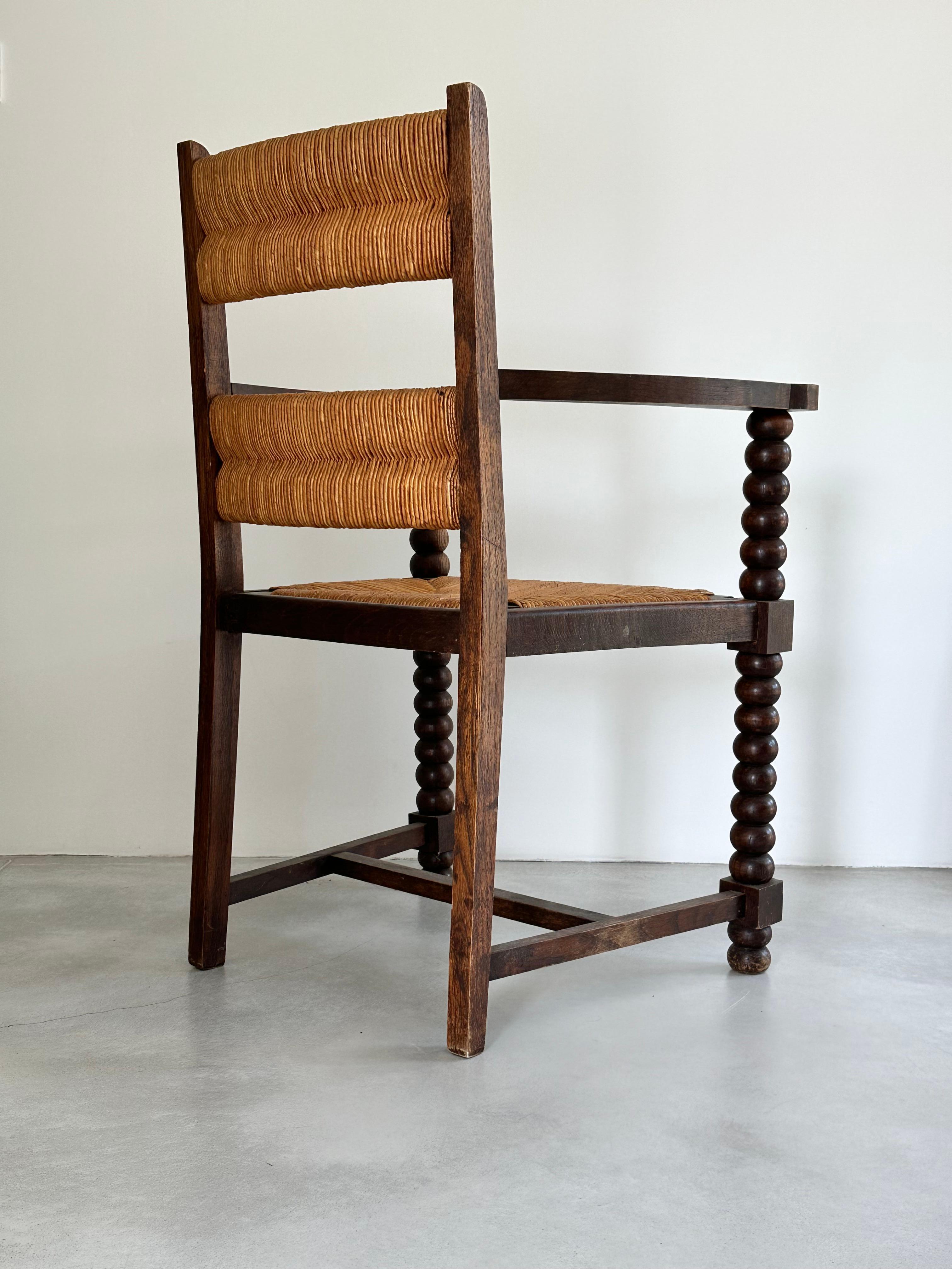 Rustic chic armchair, stained oak, straw, Charles Dudouyt style, France 1950s For Sale 3