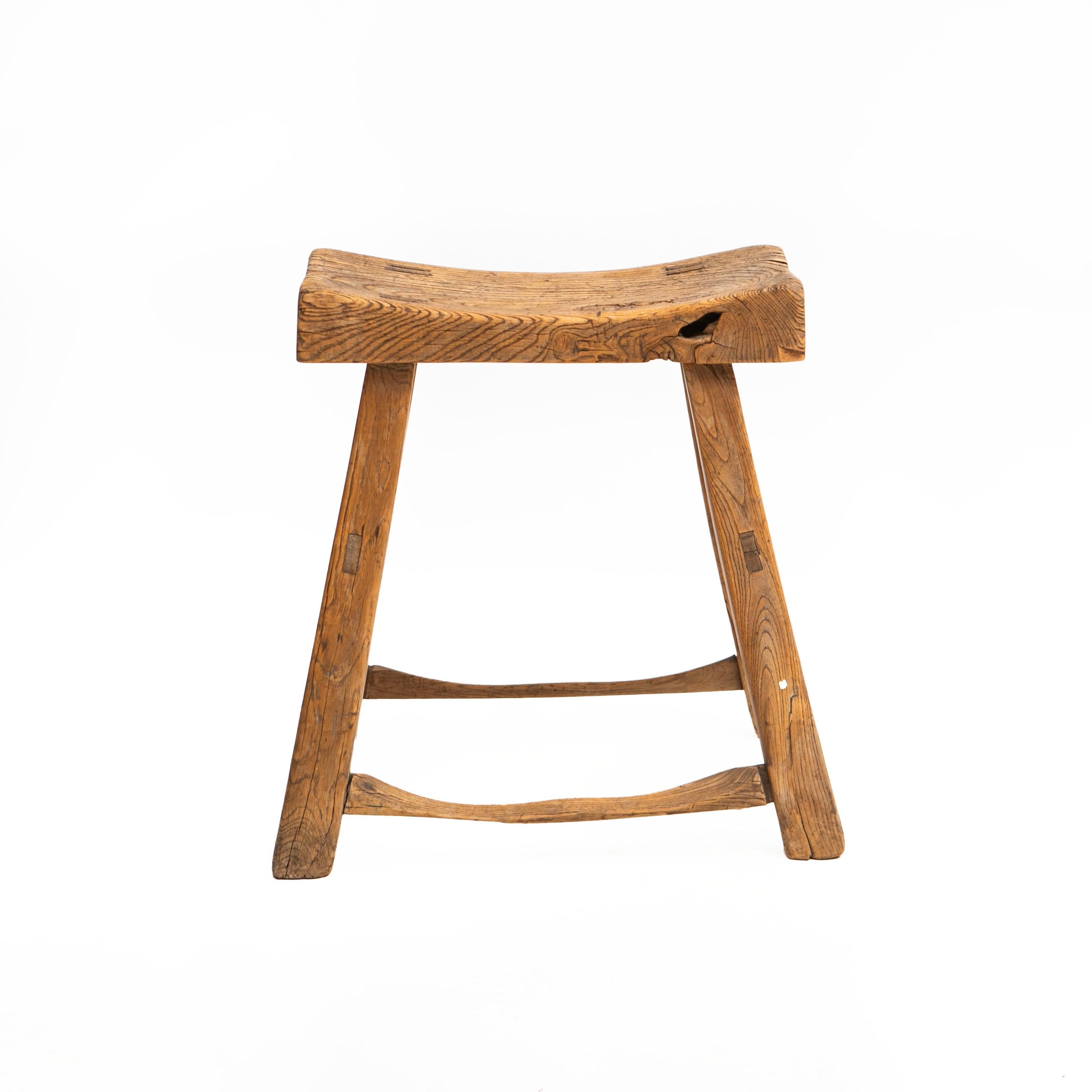 Chinese Qing period 18th century four-legged elmwood stool.
Gently restored to retain the beautiful age-related rustic look and patina.

China 18th century