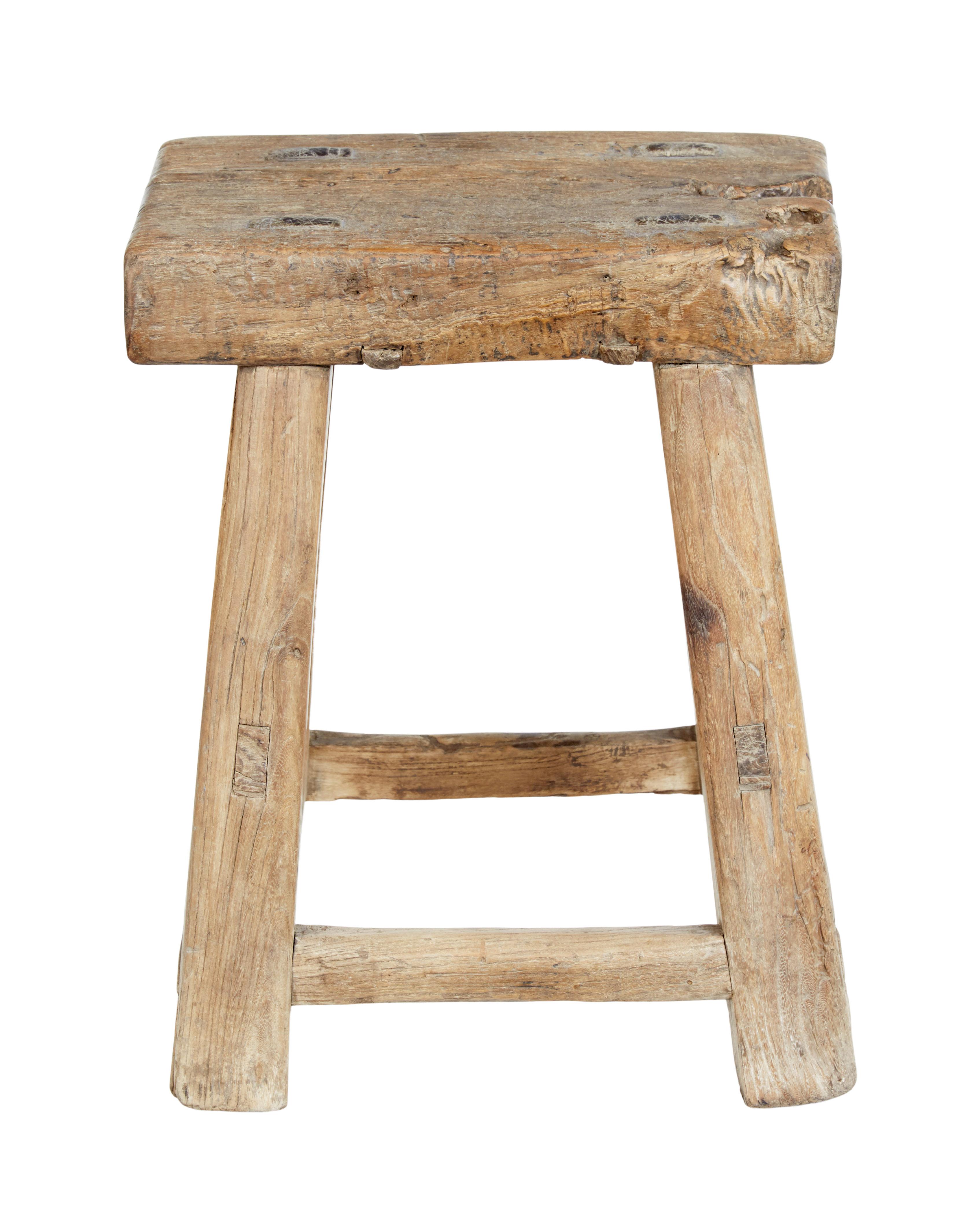 Rustic Chinese 19th century hardwood stool circa 1880.

A Fine piece of traditional Chinese craftmanship. Made from hardwood and constructed using joints. Made from real character pieces of wood with hollows, knots and splits.

Structurally