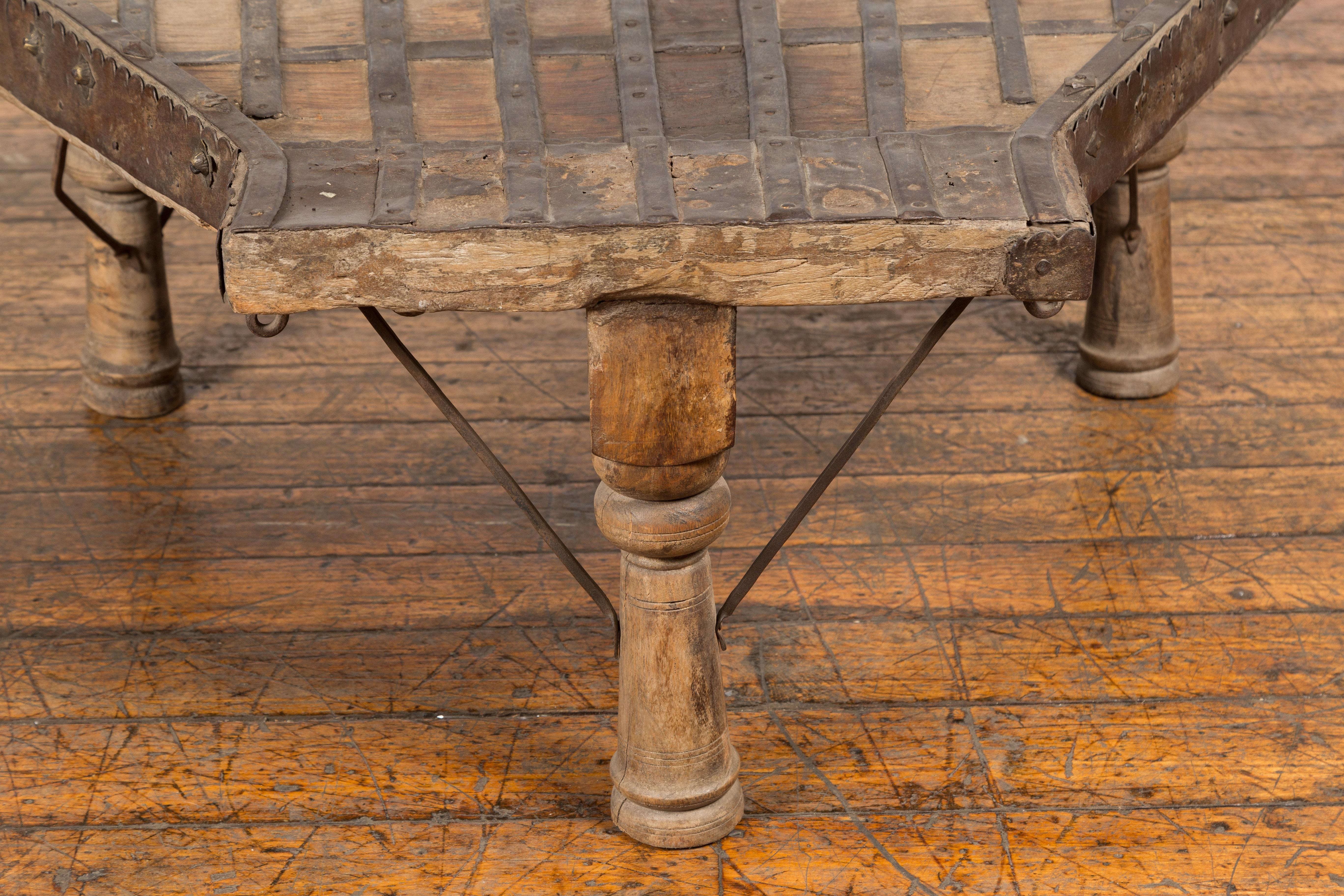 Rustic Coffee Table Made of 19th Century Indian Bullock Cart with Iron Details In Good Condition For Sale In Yonkers, NY