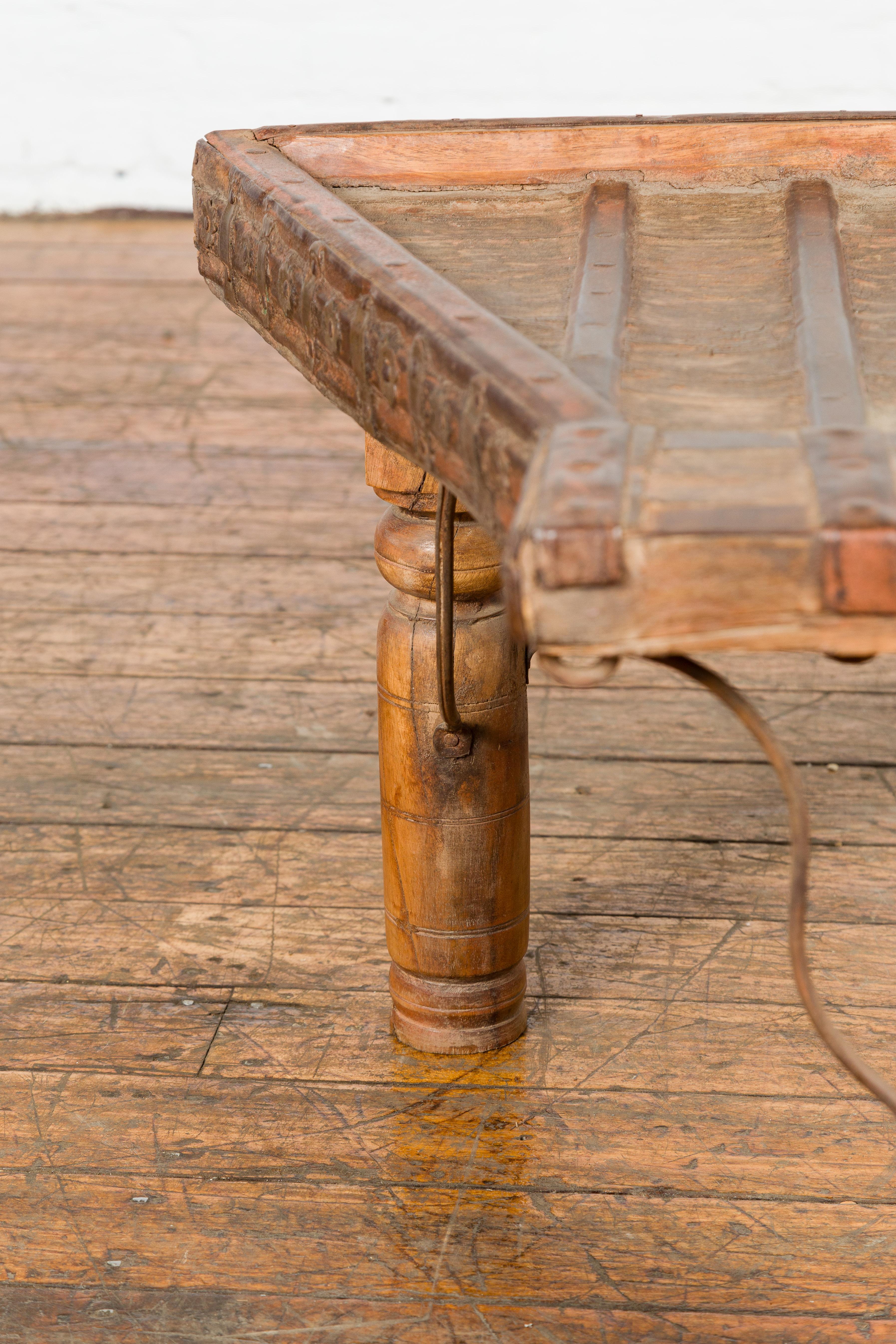 Rustic Coffee Table Made of 19th Century Indian Bullock Cart with Iron Stretcher 4