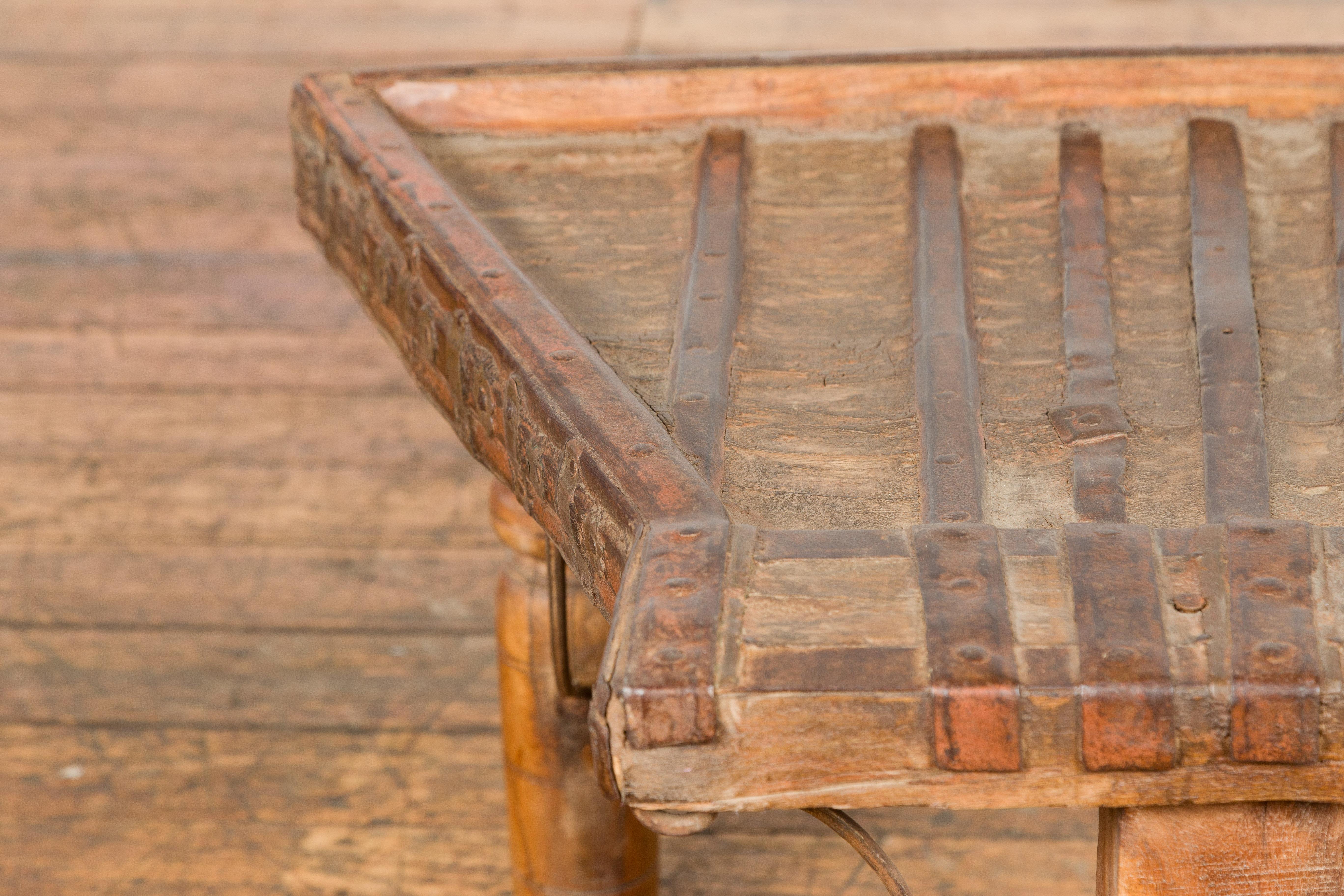 Turned Rustic Coffee Table Made of 19th Century Indian Bullock Cart with Iron Stretcher
