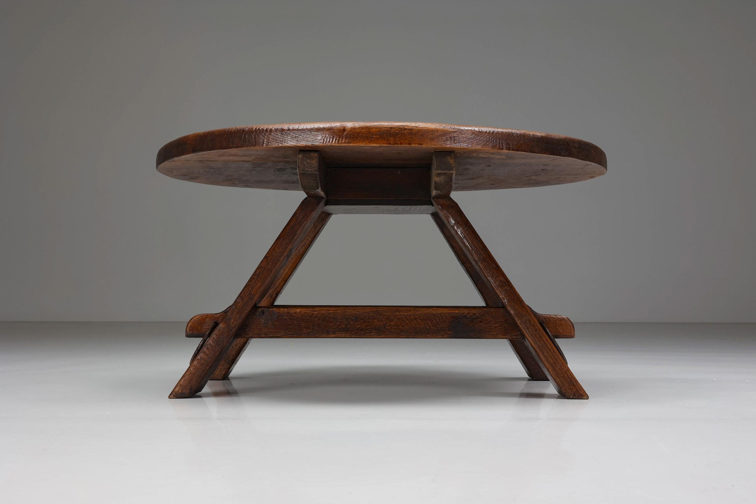 Coffee table; Craftmanship; Wabi-Sabi; Rustic; 1960's; Patina; Rustic furniture; France; 

Rustic round coffee table with ring detail in the middle, a sign of impeccable craftsmanship. Embracing the principles of wabi-sabi, this side table shows