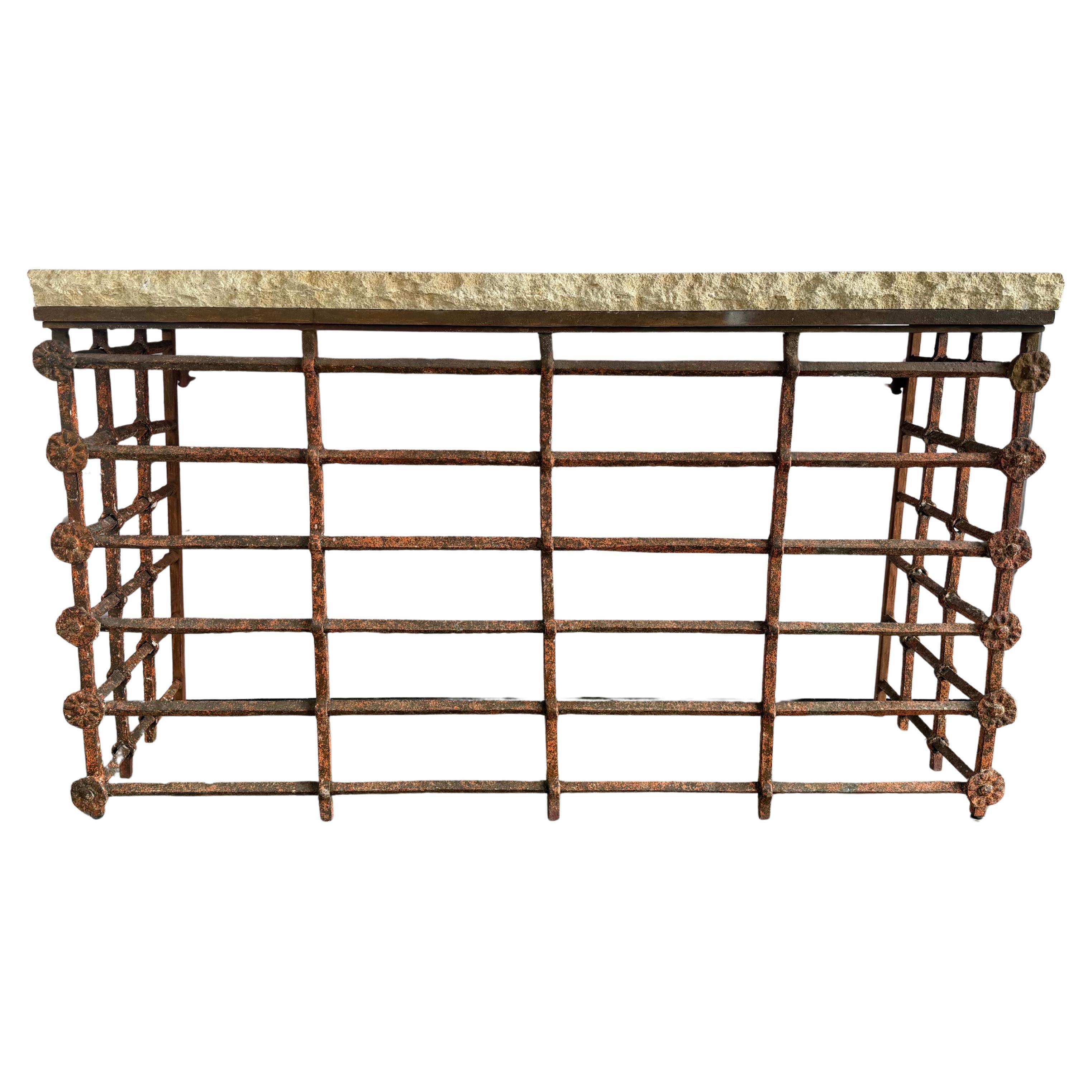 Rustic Console Table with Textured Stone Top and Hand-Forged Iron Base For Sale