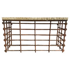 Rustic Console Table with Textured Stone Top and Hand-Forged Iron Base