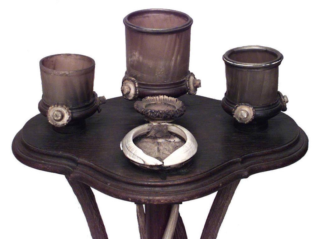 Rustic Continental (possibly German, 19th Cent) oak and antler design pedestal base smoking stand with 3 round horn containers on top
