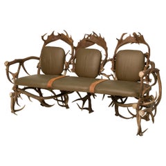 Rustic Continental Style Green Leather and Faux Antler Three-Seat Settee