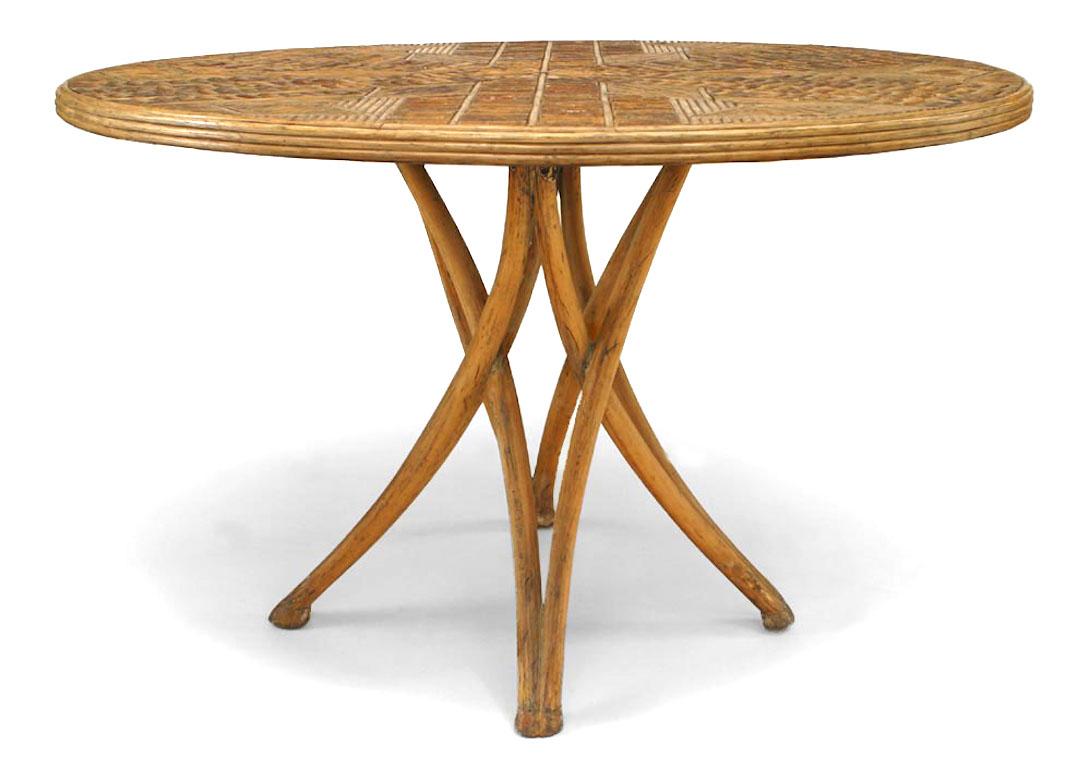 Rustic Continental-style (20th Century) stripped dining table with round slat twig geometric design top supported on bentwood cross leg design base
