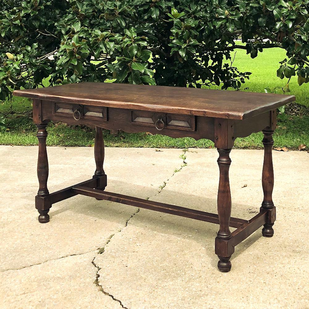 Rustic Country French oak desk ~ Writing table makes a great choice as a sofa table in a casual room, as well! Hand-crafted from thick planks and timbers of solid oak, it features tailored lines with four gracefully turned legs connected with an 