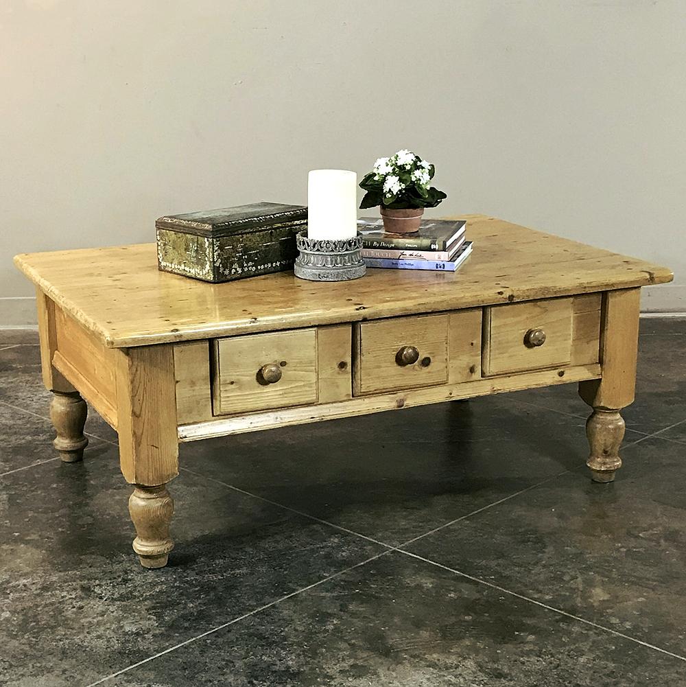 Rustic country French pine coffee table is the perfect choice for a casual decor! Handcrafted from solid planks and timbers of yellow pine, it features turned legs for sturdy support, with three drawers making it wonderfully functional as well. The