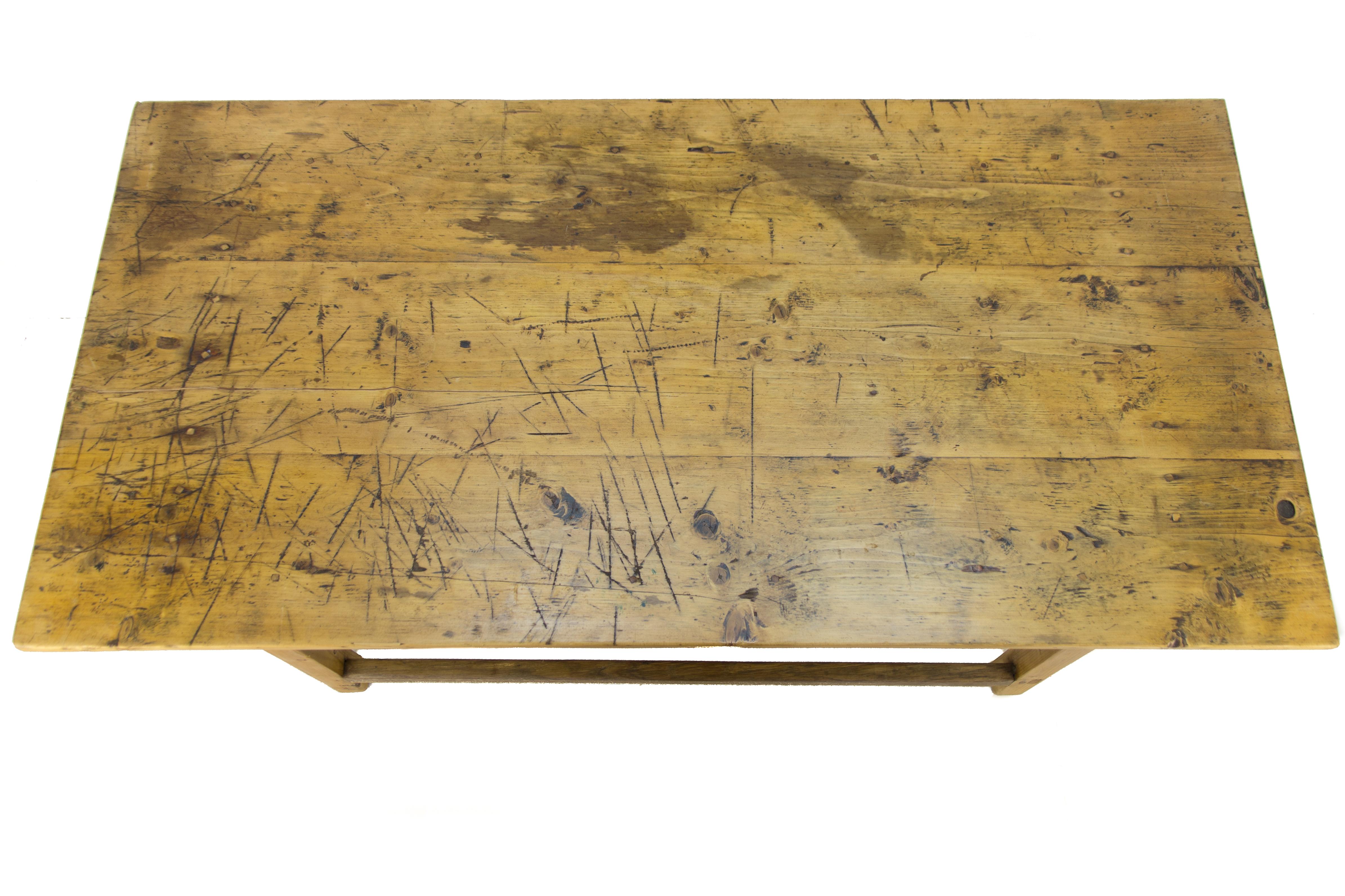Rustic Country style table with two drawers. Made of Baltic pine, circa the 1930s. The table is of very solid construction, stable, and in good antique condition. Please expect dents, marks, and scuffs due to its age and use.
Dimensions: height 79