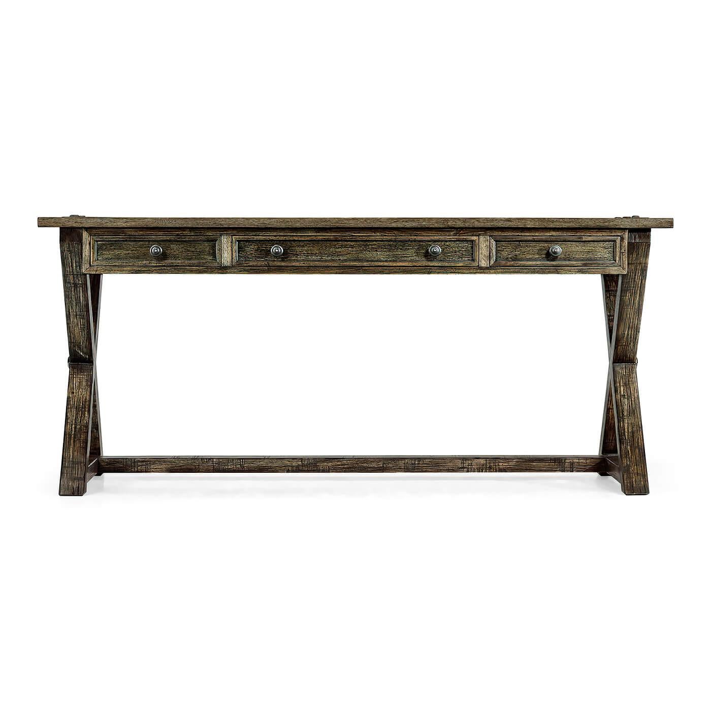 A rustic country-style solid driftwood finished rectangular desk with a rustic finish revealing exposed saw marks. Three small oak-lined drawers to front with mortice and tenon joints to X-frame support and top surface.

Dimensions: 68