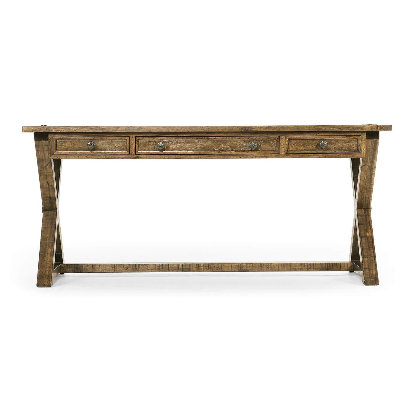 A rustic country-style solid light driftwood finished rectangular desk with a rustic finish revealing exposed saw marks. Three small oak-lined drawers to front with mortice and tenon joints to X-frame support and top surface.

Dimensions: 68