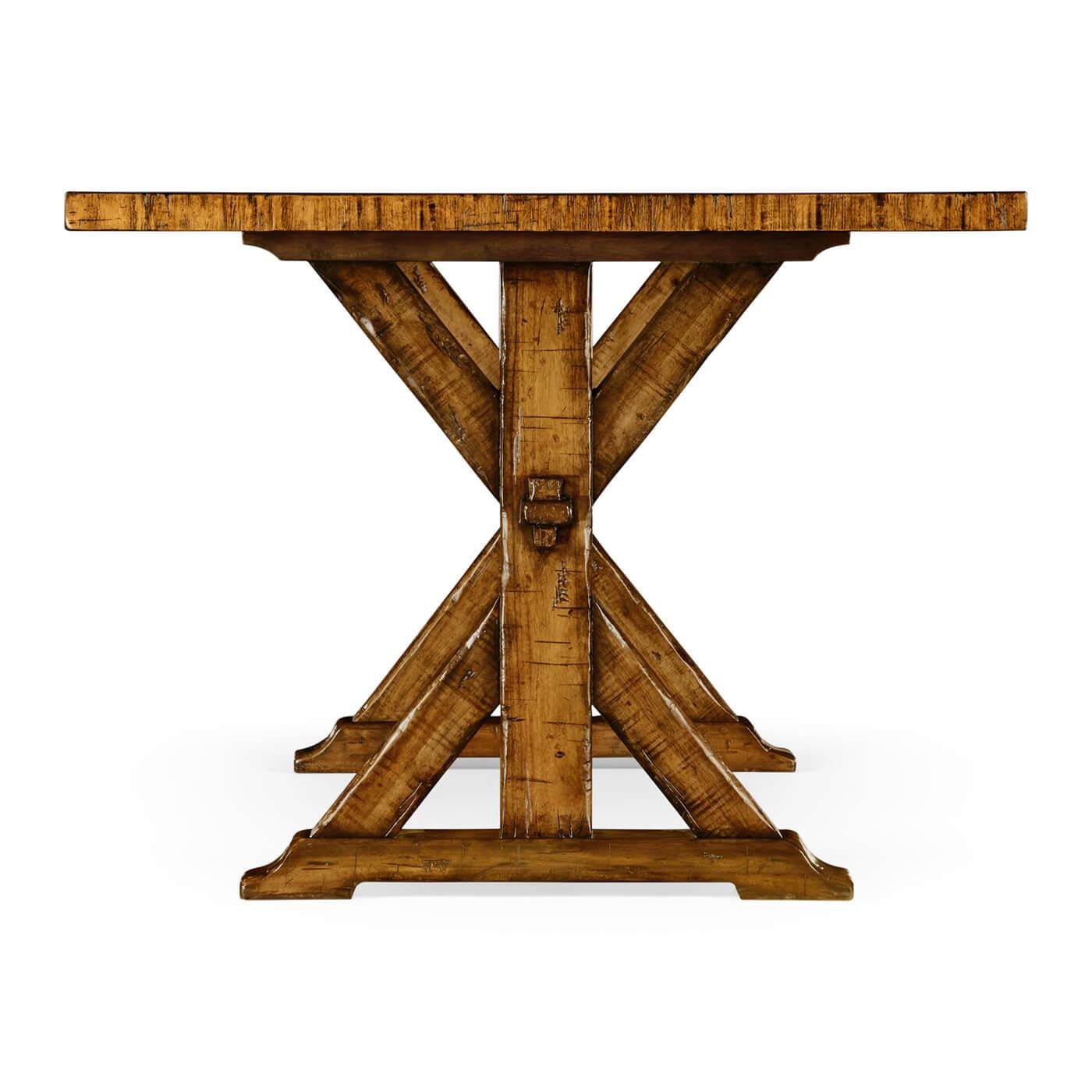 A rustic country walnut Refectory dining table with a rectangular walnut top and a rustic finish revealing exposed saw marks, with mortice and tenon joints to the stretcher and trestle end uprights.

Dimensions: 72
