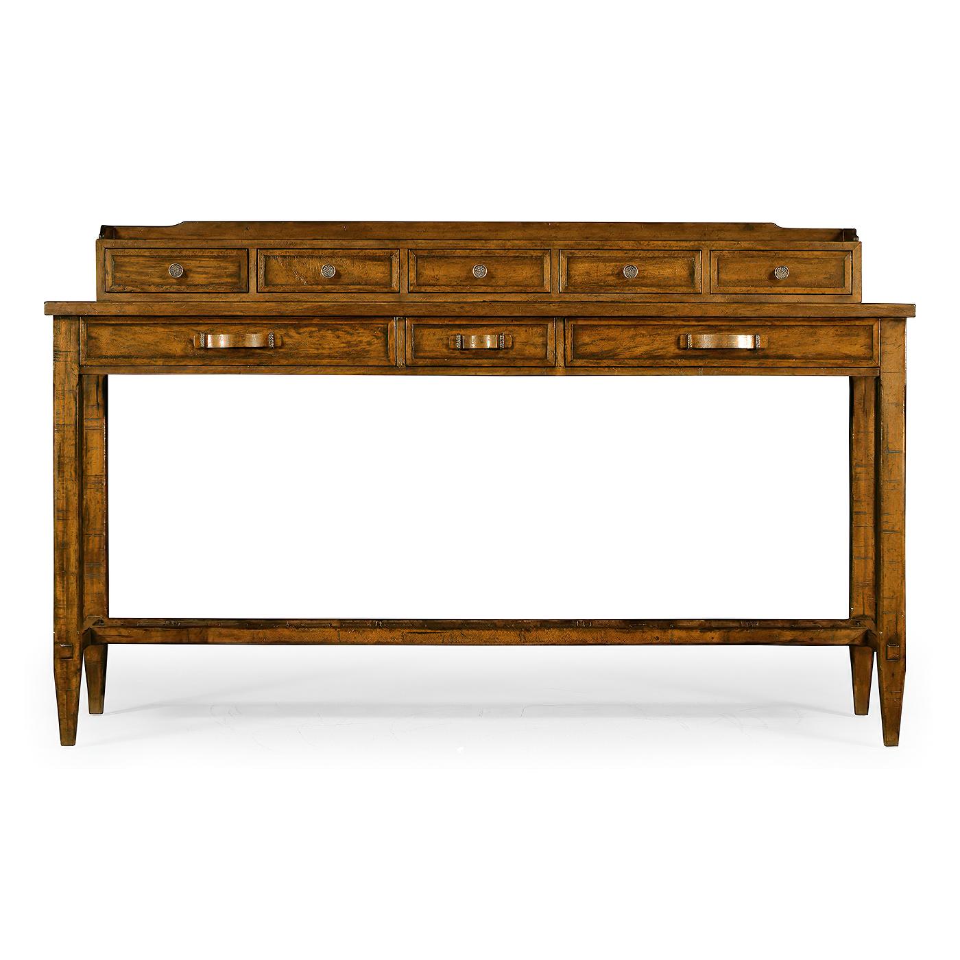 Country style planked walnut sideboard with a register of drawers set to the rear. Three strap handled drawers to the front set with oak dividers. Storage rack beneath. 

Dimensions: 72