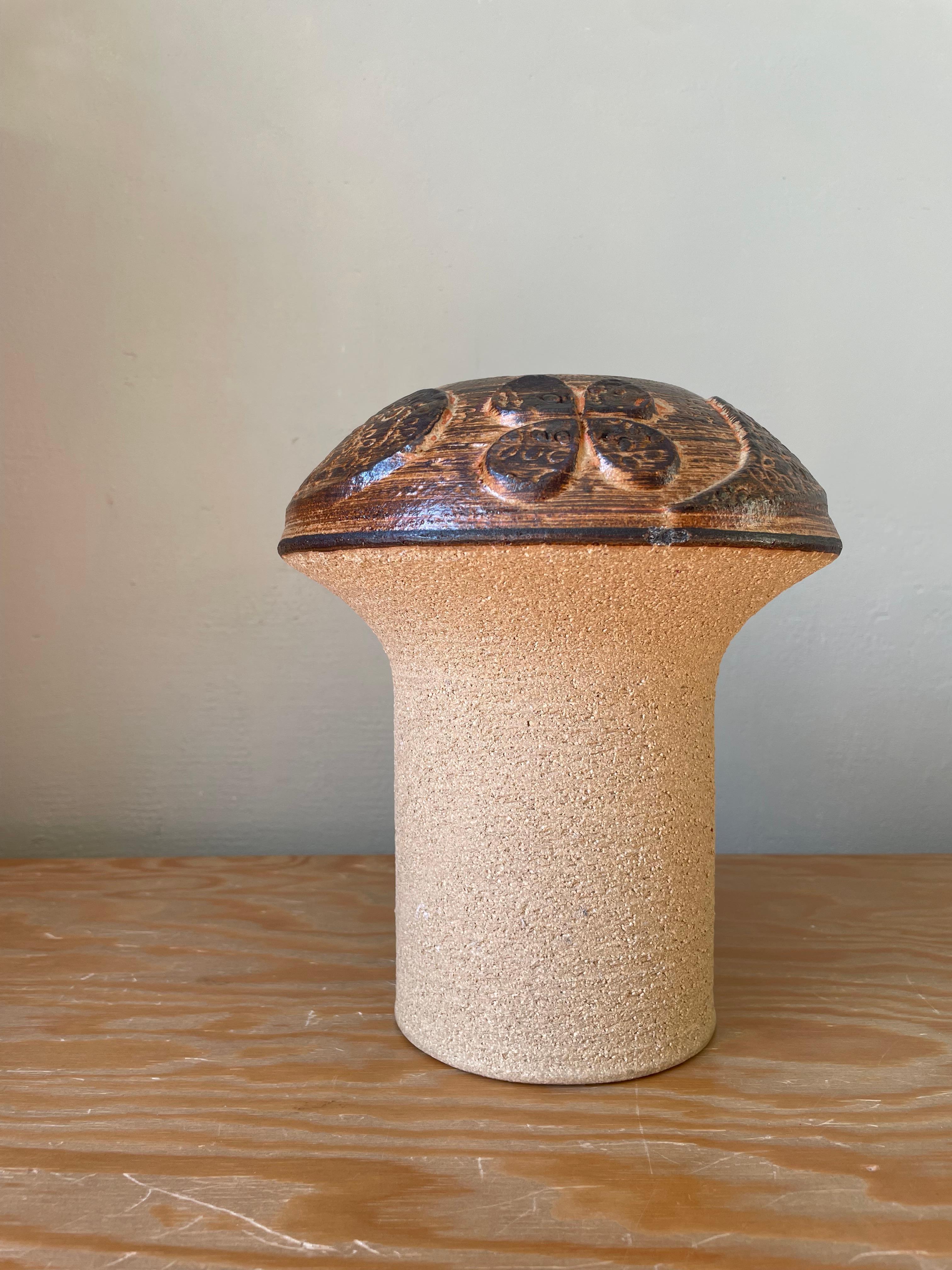 Large rustic Danish Modern stoneware vase handmade by designer Haico Nitzsche. Manufactured on the island of Bornholm by Søholm Stentøj in the mid 1970s. Mushroom shape with sand colored raw base and shiny glazed earthcolored brown top with organic