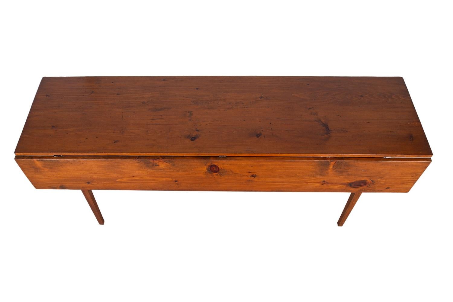 A vintage rustic pine drop leaf 6 ft 6