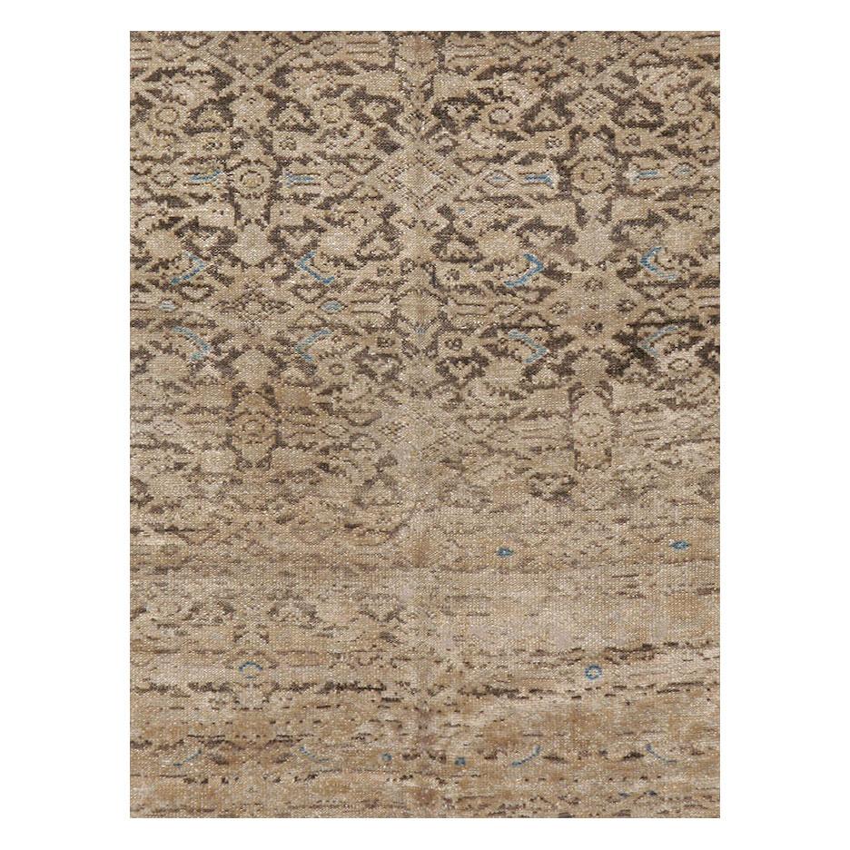 An antique Persian Malayer accent rug in gallery format handmade during the early 20th century with a rustic design in brown and cream tones.

Measures: 5' 3
