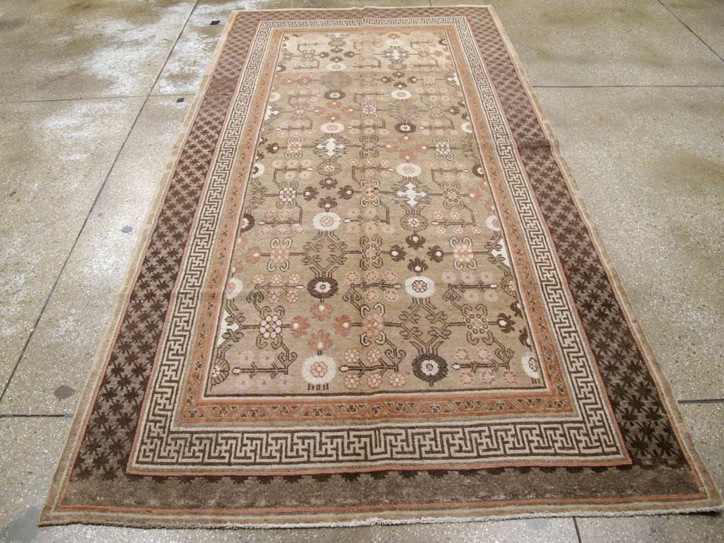 Hand-Knotted Rustic Early 20th Century Handmade East Turkestan Khotan Gallery Accent Rug For Sale