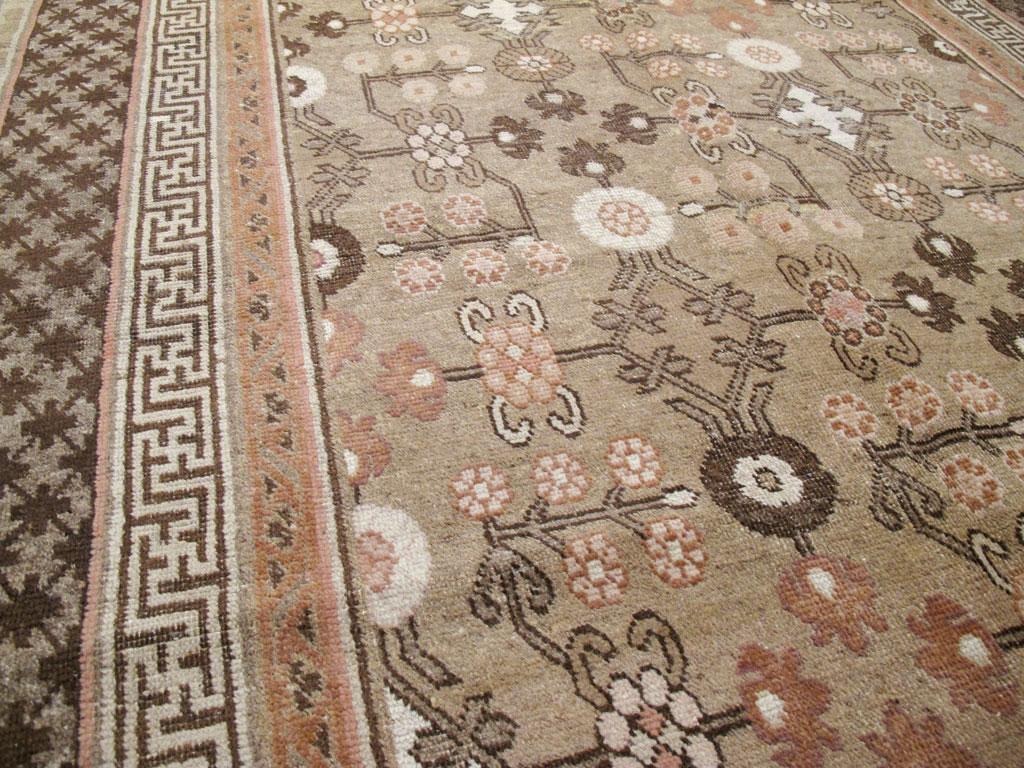 Rustic Early 20th Century Handmade East Turkestan Khotan Gallery Accent Rug In Good Condition For Sale In New York, NY