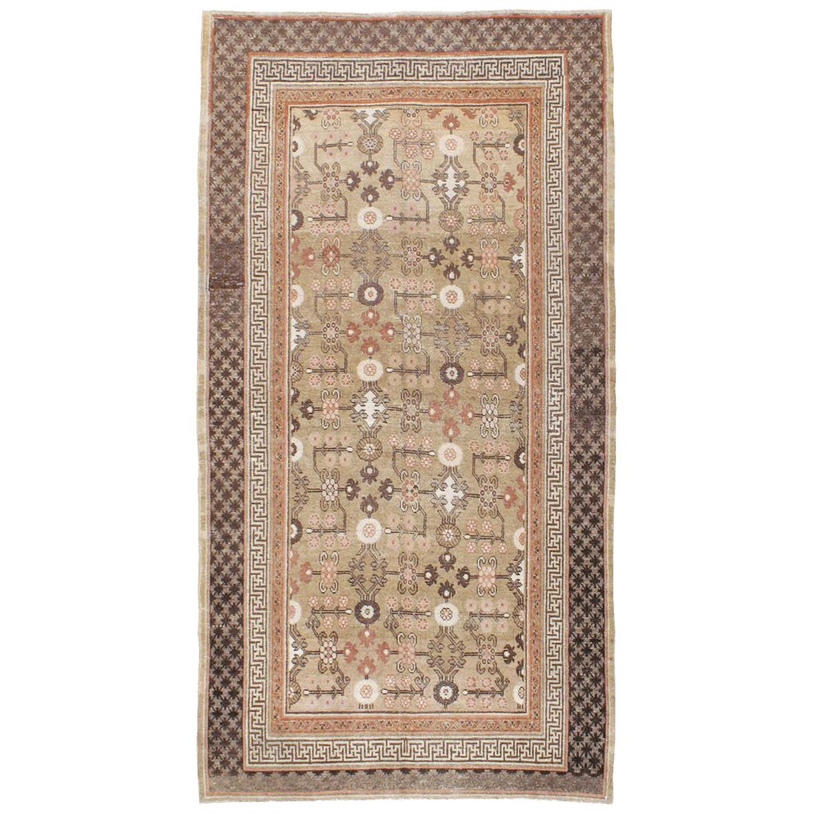 Rustic Early 20th Century Handmade East Turkestan Khotan Gallery Accent Rug For Sale