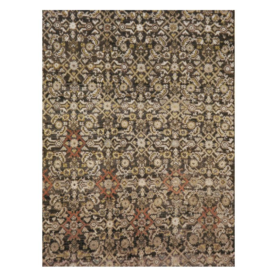 A rustic antique Persian accent rug in gallery format handmade by the Kurdish groups of Persia during the early 20th century.

Measures: 6'0
