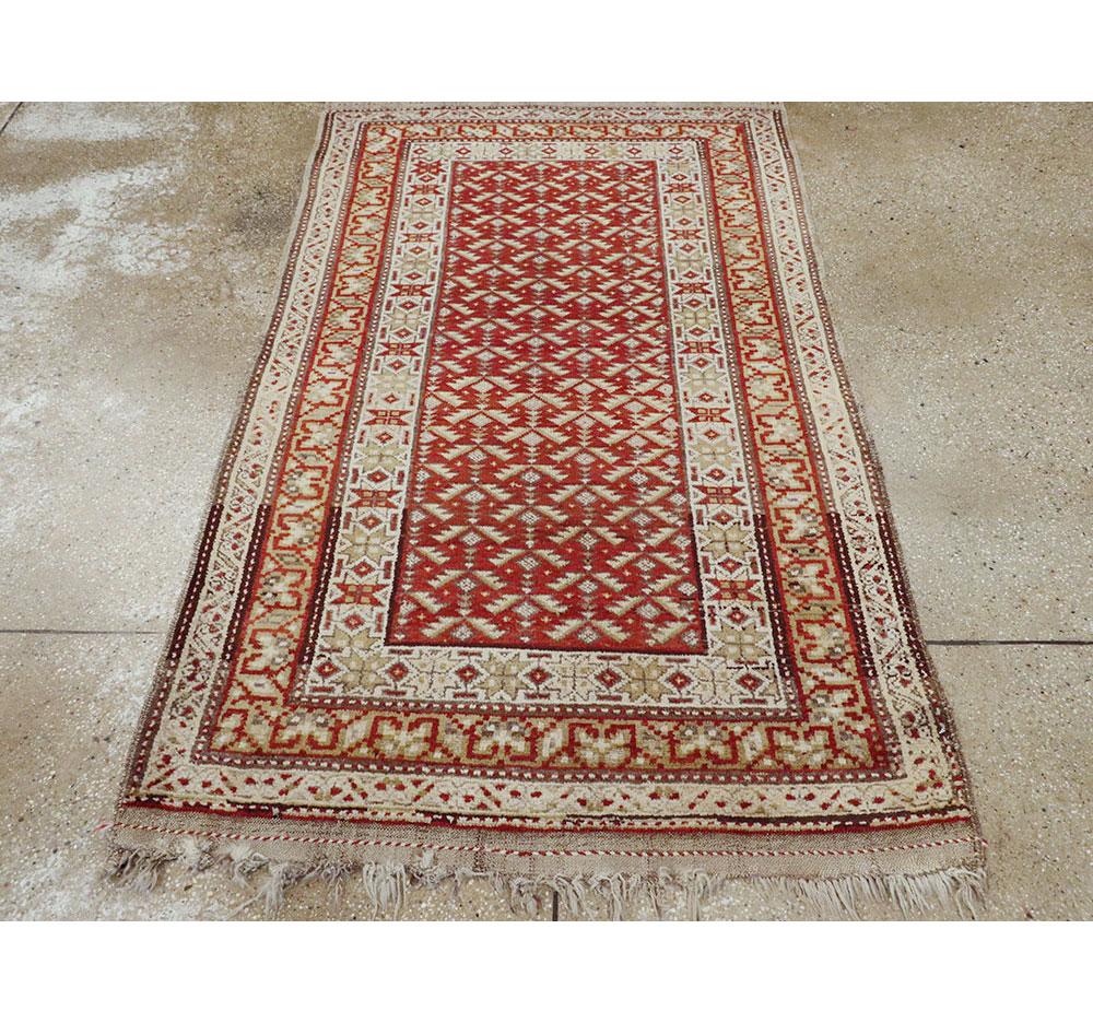Hand-Knotted Rustic Early 20th Century Handmade Persian Kurd Throw Rug in Red & Cream For Sale