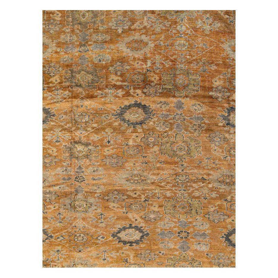 An antique Persian Mahal room size carpet handmade during the early 20th century in the rustic style.

Measures: 11'2