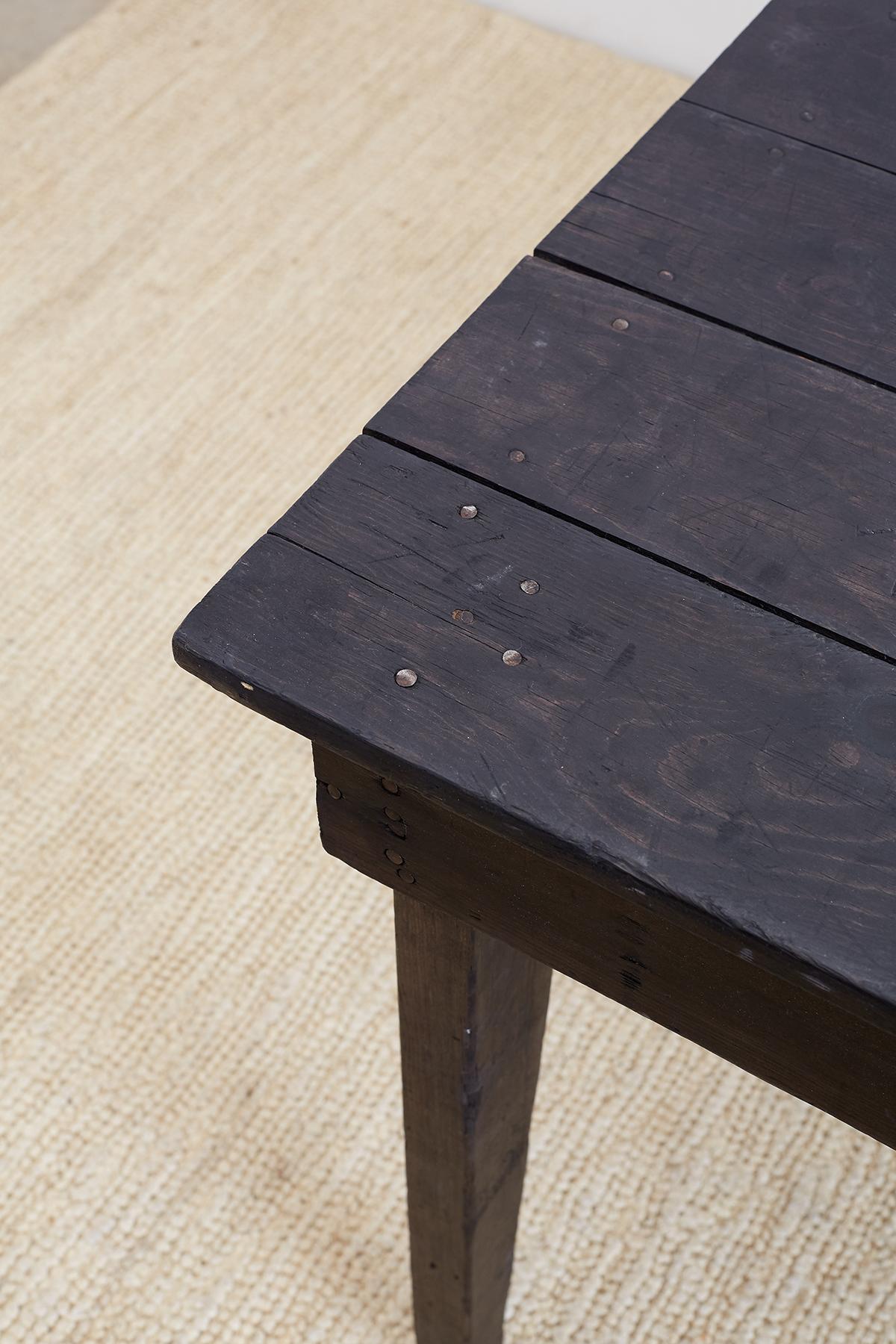 20th Century Rustic Ebonized Pine Farmhouse Dining Table