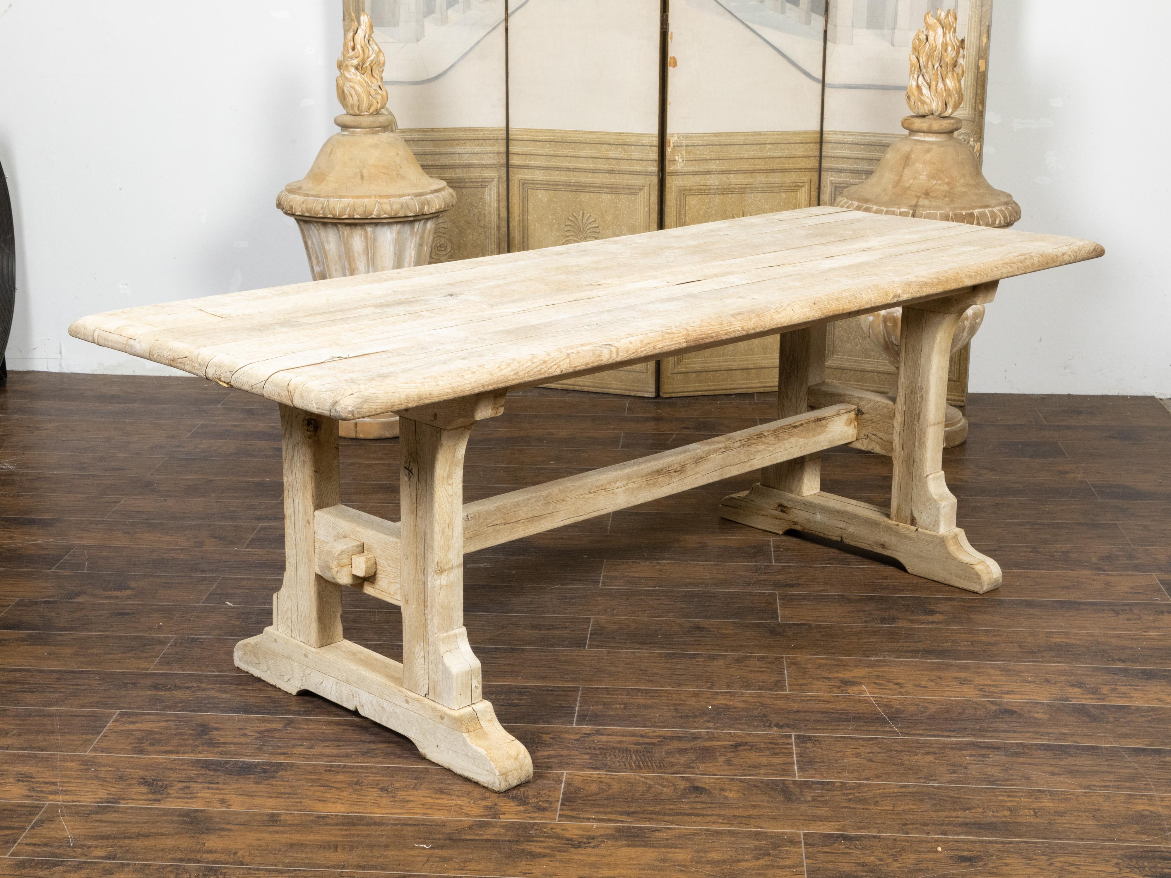 Rustic English 19th Century Natural Wood Farm Table with Trestle Base For Sale 7
