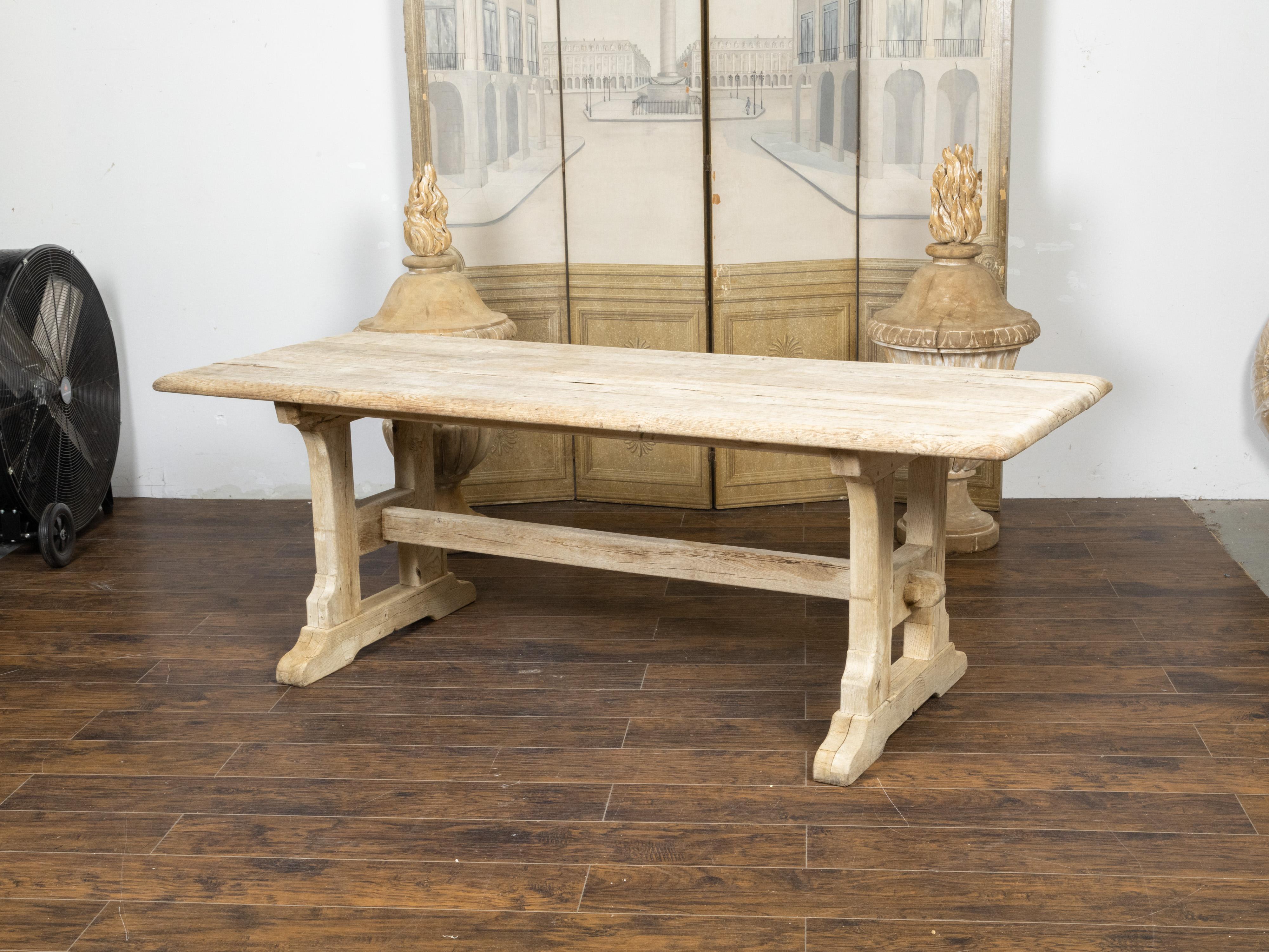 Rustic English 19th Century Natural Wood Farm Table with Trestle Base For Sale 3