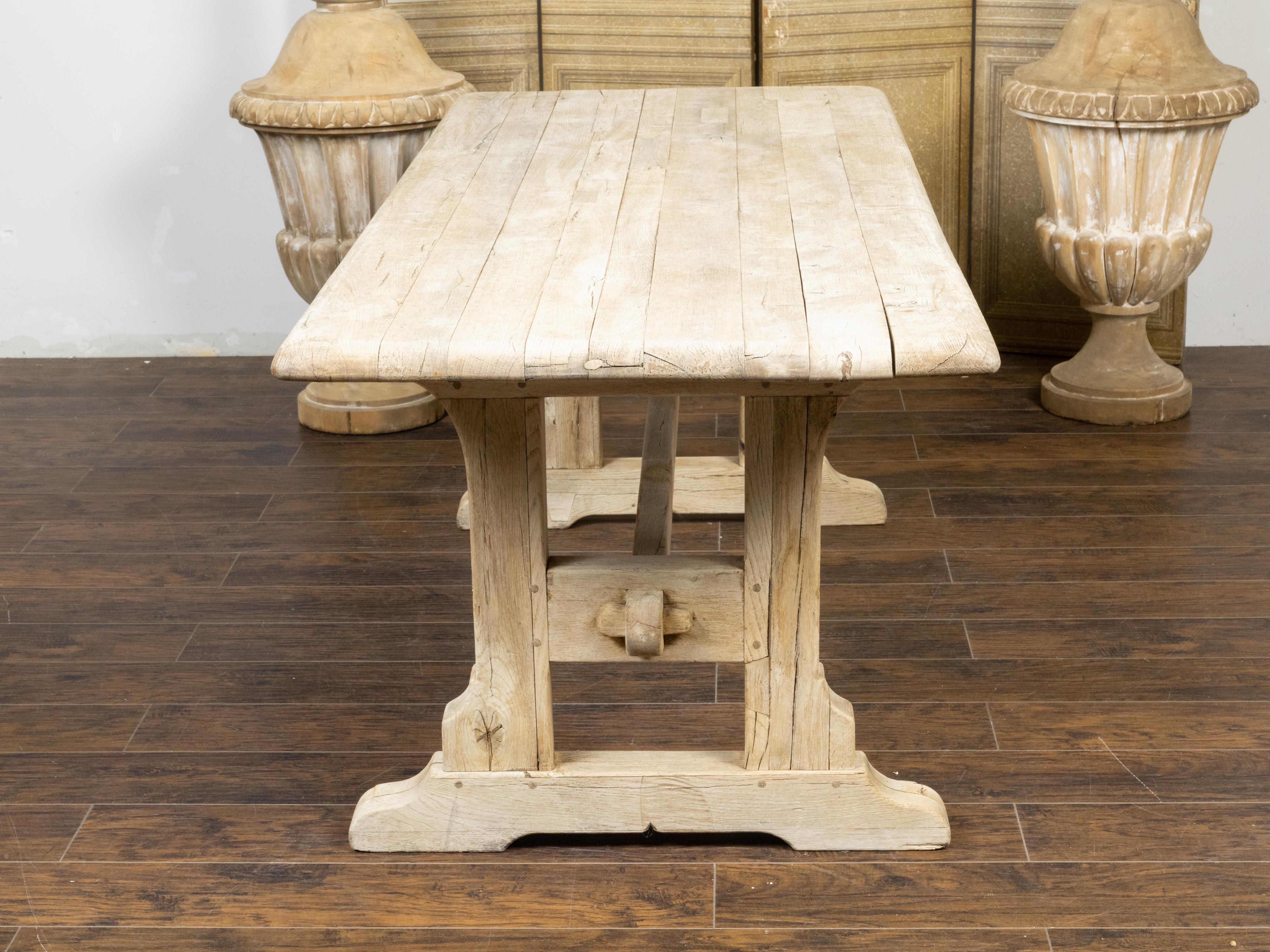 Rustic English 19th Century Natural Wood Farm Table with Trestle Base For Sale 4