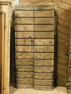 Rustic entrance door in nailed wood with two leaves, Italy