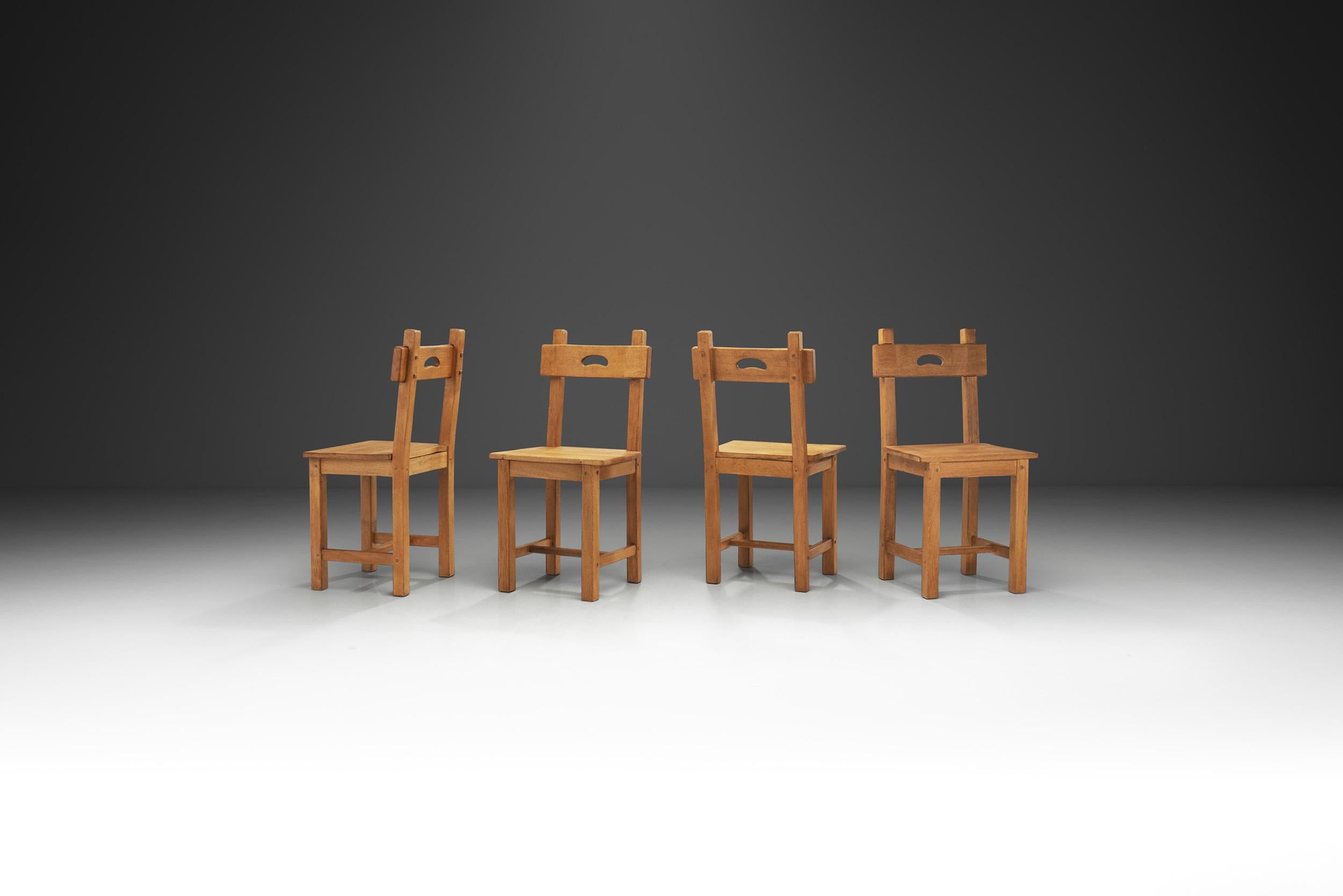 Mid-Century Modern Rustic European Cabinetmaker Oak Dining Chairs, Europe ca 1950s For Sale