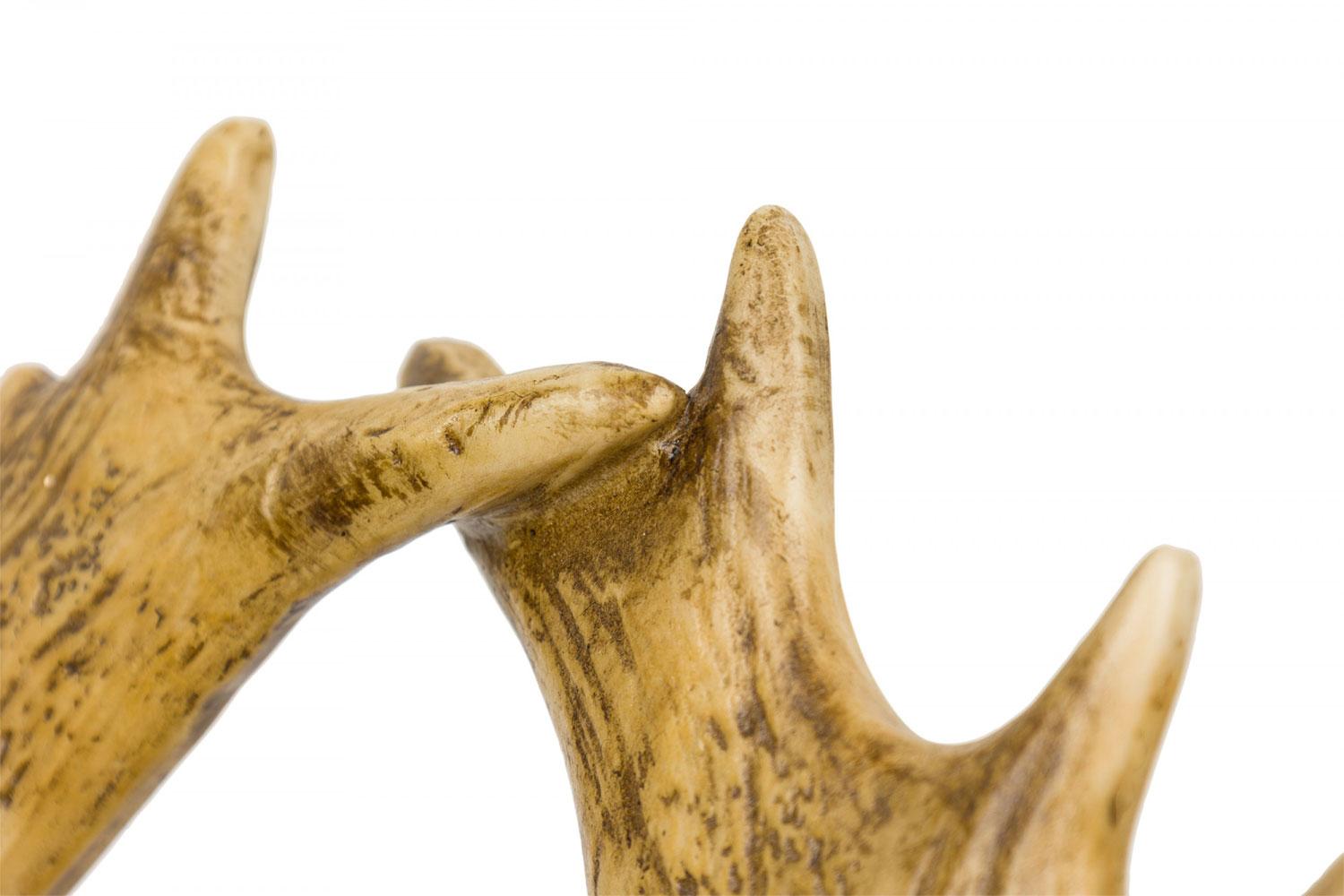 Palco Portariviste rustico in finta corna di alce in vendita