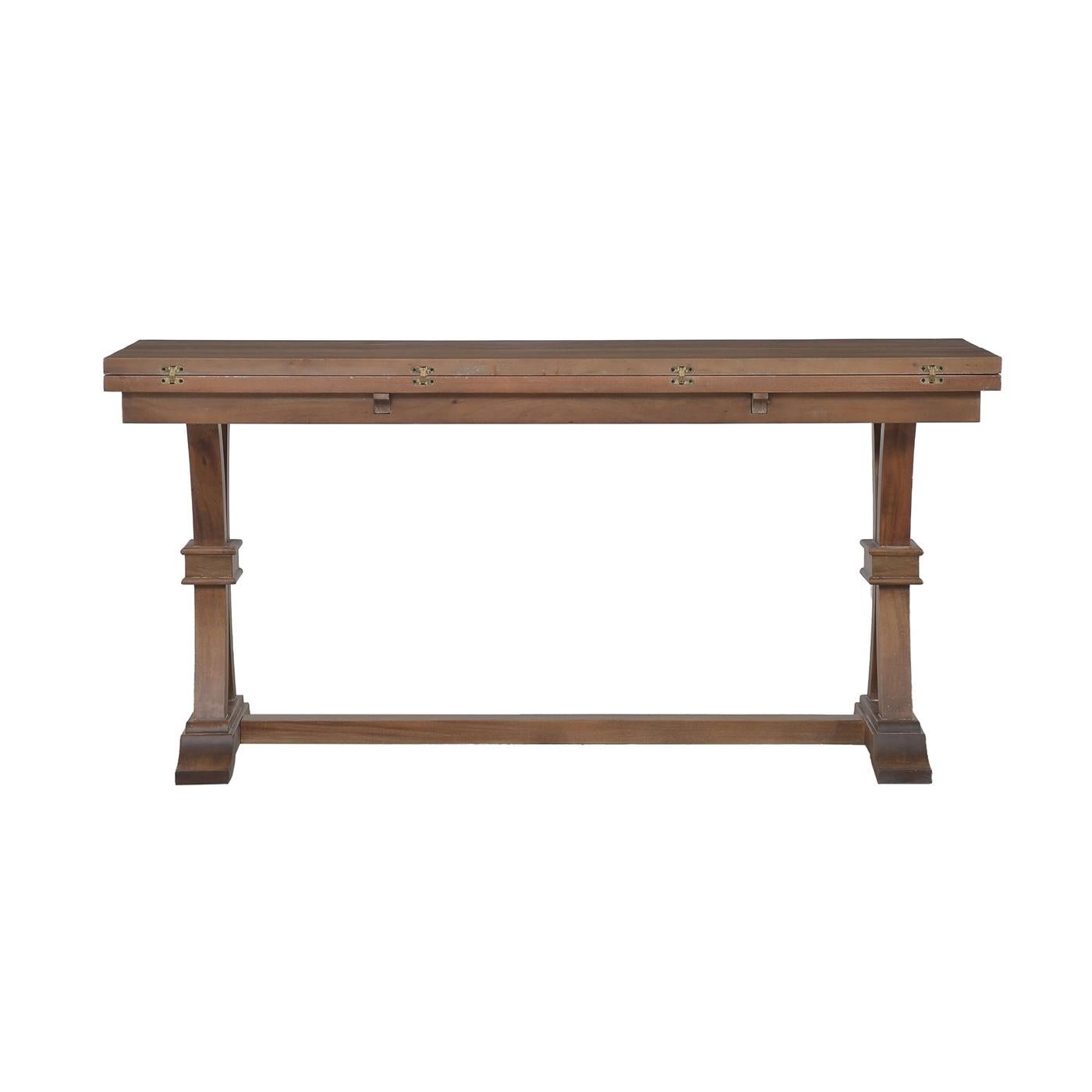 A perfect blend of functionality and timeless charm. Crafted from solid mahogany, this table features a fold-out design, offering versatility to suit your needs. Whether you use it as a compact console table or extend it for additional dining or