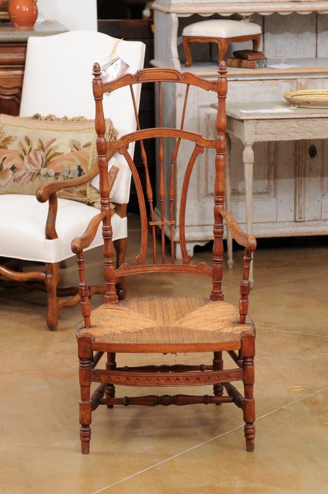 Rustic French 1890s Cherry Wood Armchair with Rush Seat and Sheaf Back For Sale 8
