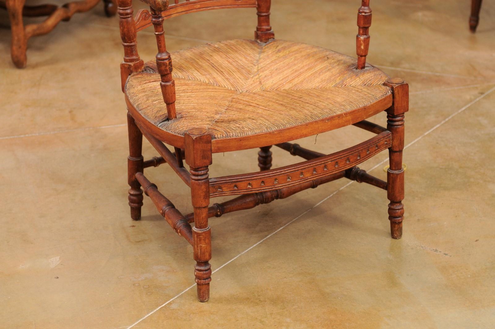 19th Century Rustic French 1890s Cherry Wood Armchair with Rush Seat and Sheaf Back For Sale