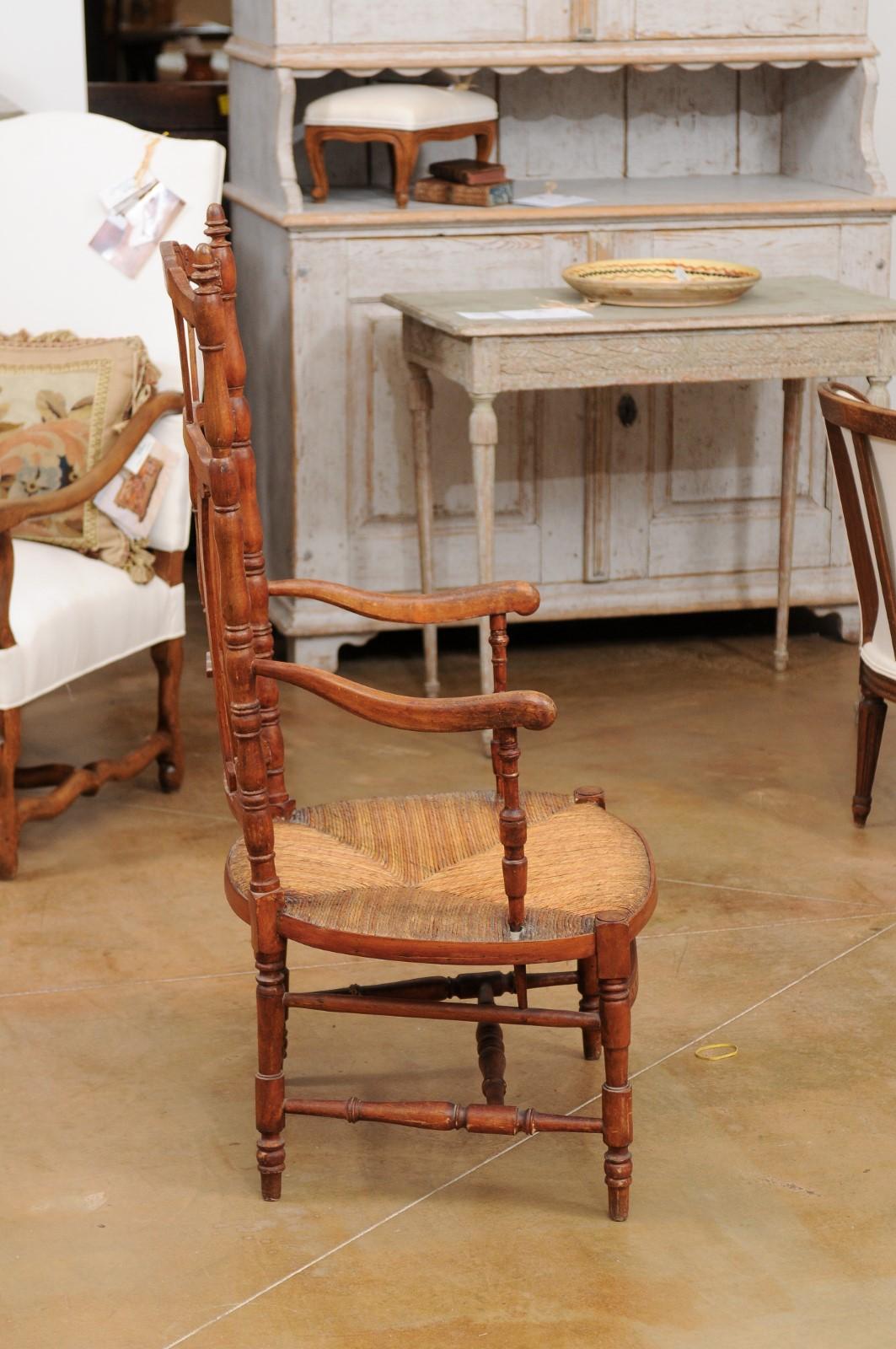 Rustic French 1890s Cherry Wood Armchair with Rush Seat and Sheaf Back For Sale 2