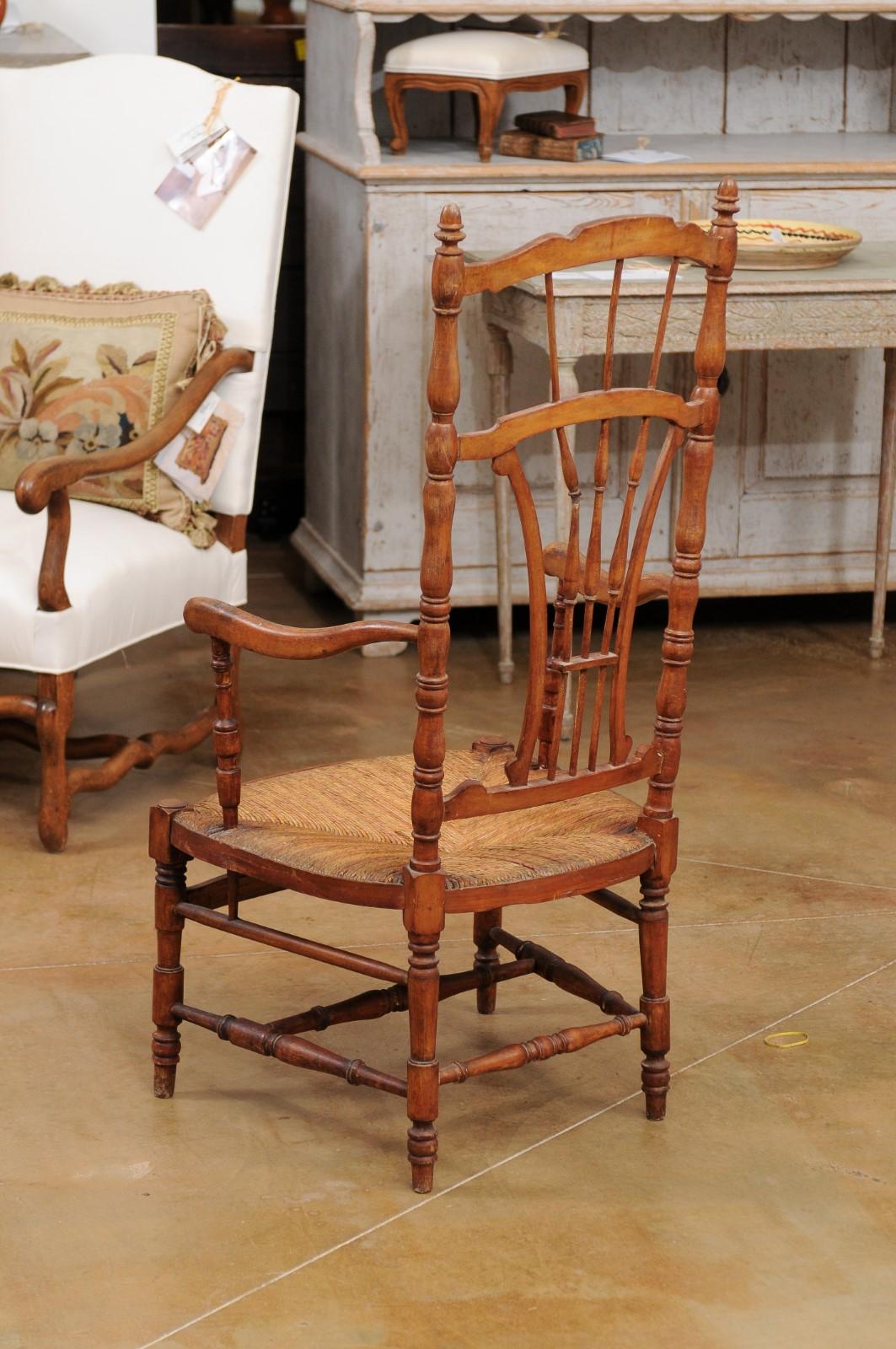 Rustic French 1890s Cherry Wood Armchair with Rush Seat and Sheaf Back For Sale 5