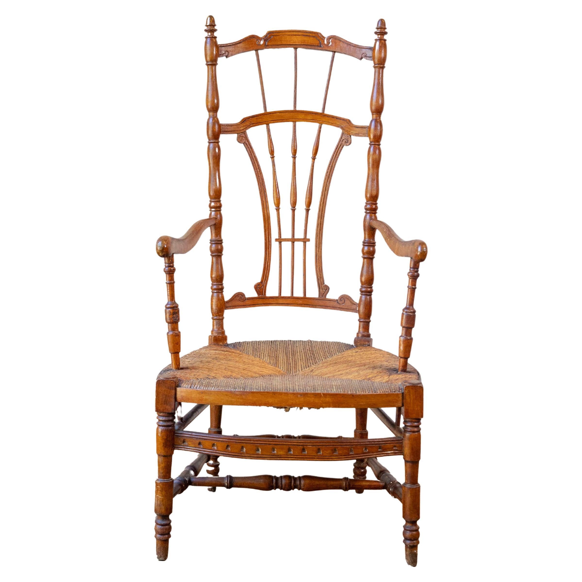 Rustic French 1890s Cherry Wood Armchair with Rush Seat and Sheaf Back