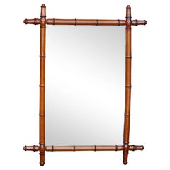 Miroir rustique français des années 1920 en faux bambou et noyer de couleur Honey Brown