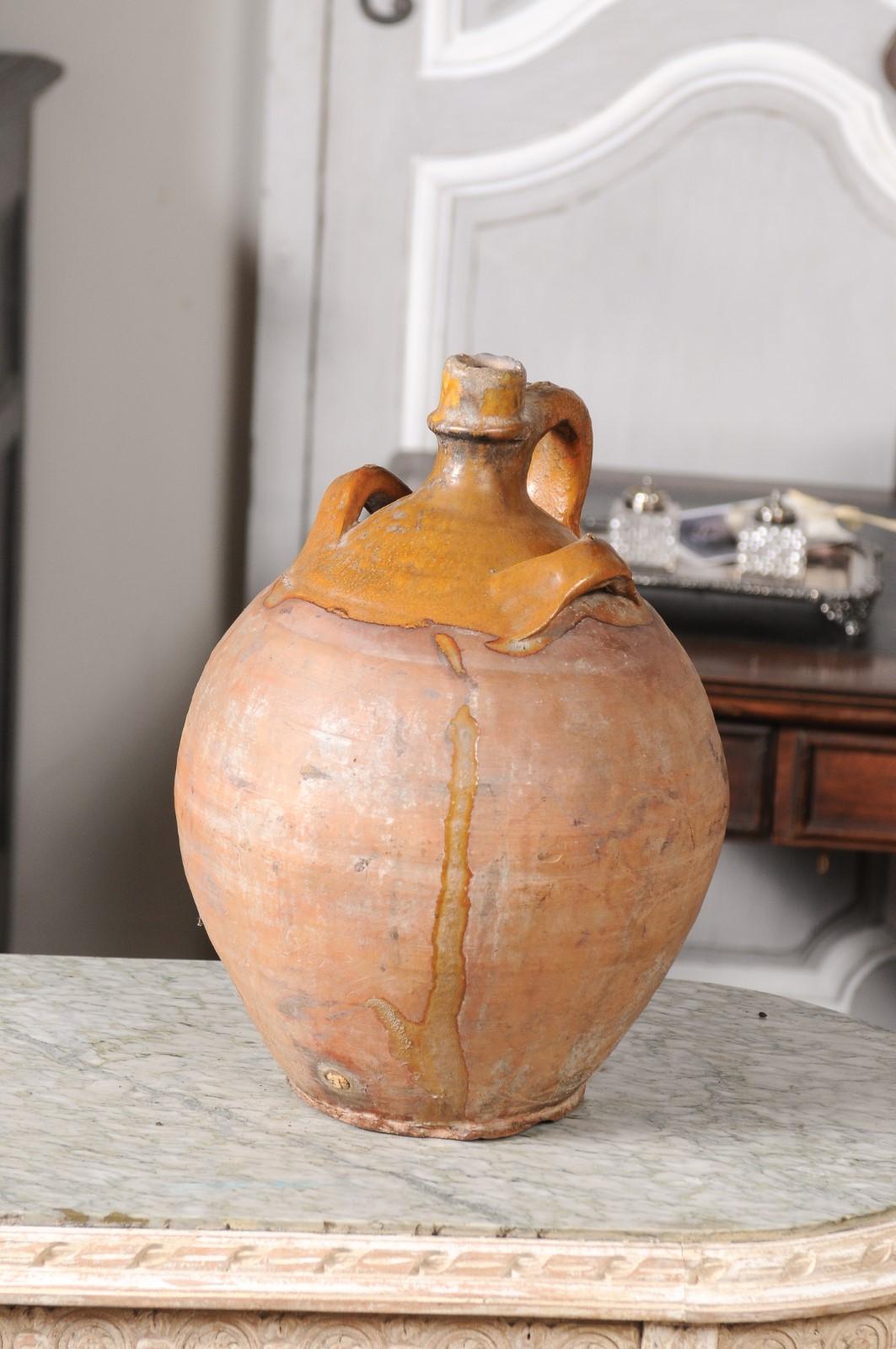 Rustic French 19th Century Pottery Jug with Yellow Glaze and Three Handles For Sale 6