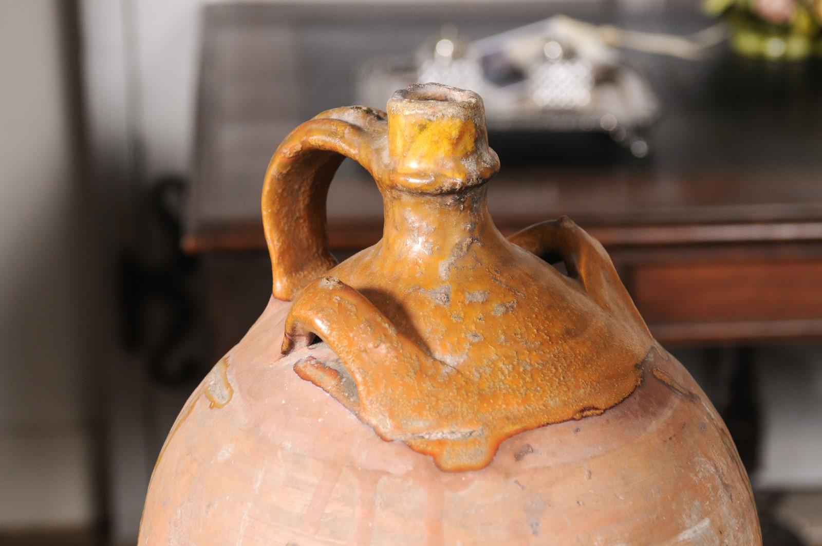 Rustic French 19th Century Pottery Jug with Yellow Glaze and Three Handles In Good Condition For Sale In Atlanta, GA