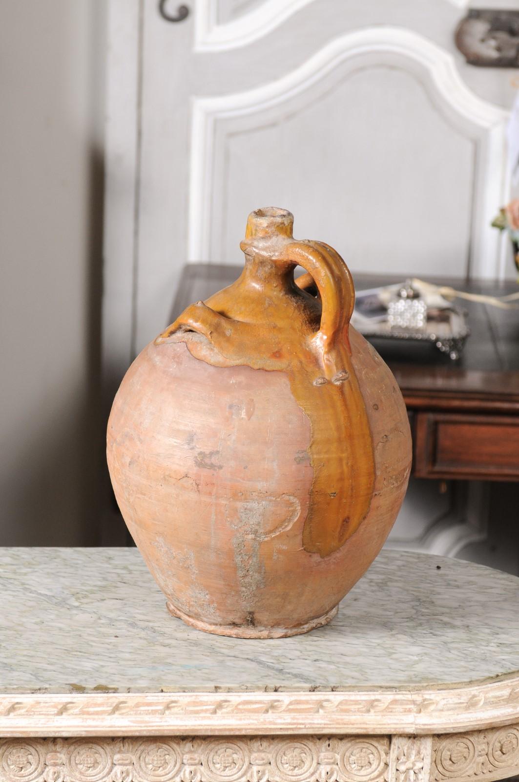 Rustic French 19th Century Pottery Jug with Yellow Glaze and Three Handles For Sale 4