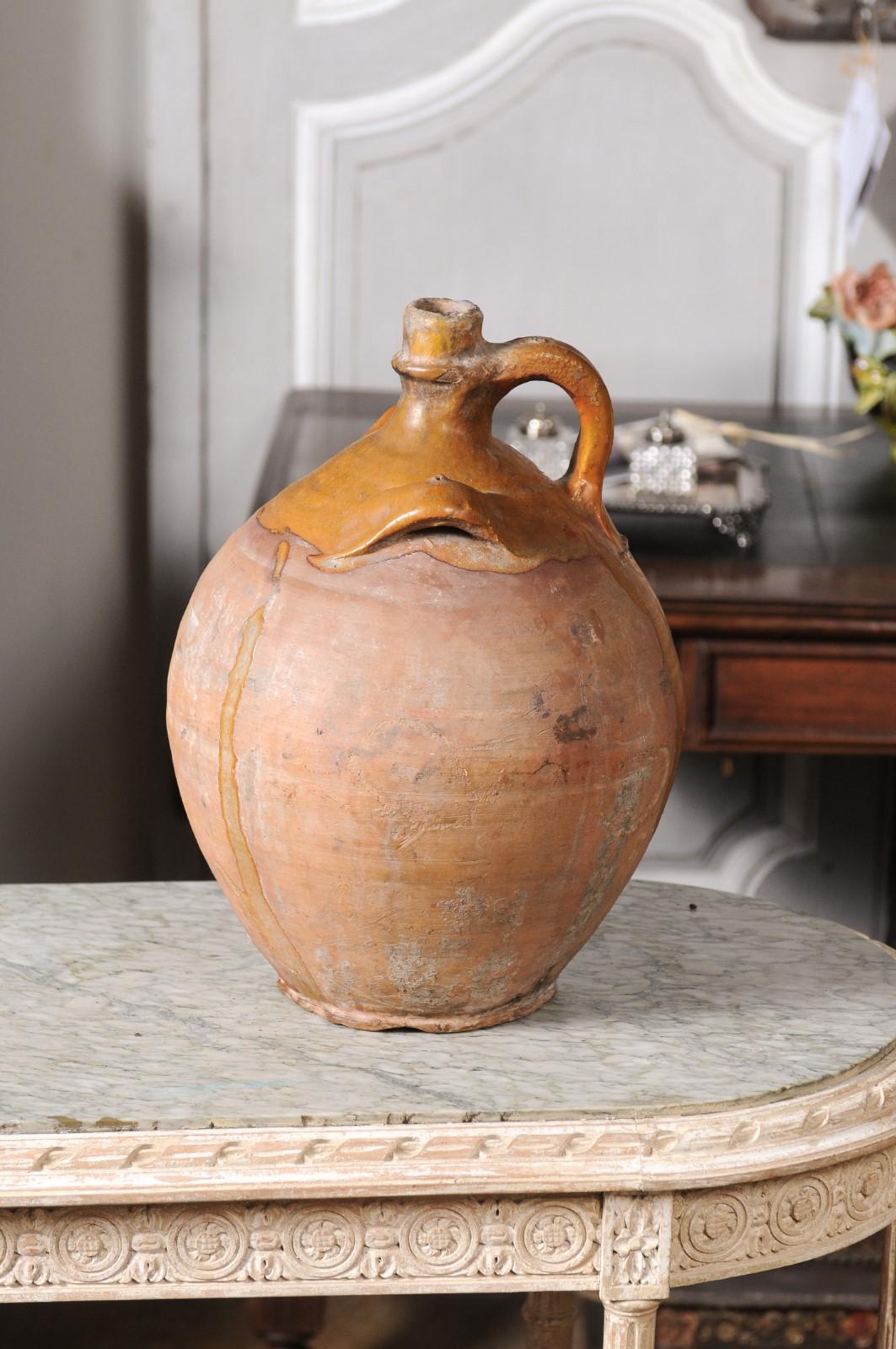 Rustic French 19th Century Pottery Jug with Yellow Glaze and Three Handles For Sale 5