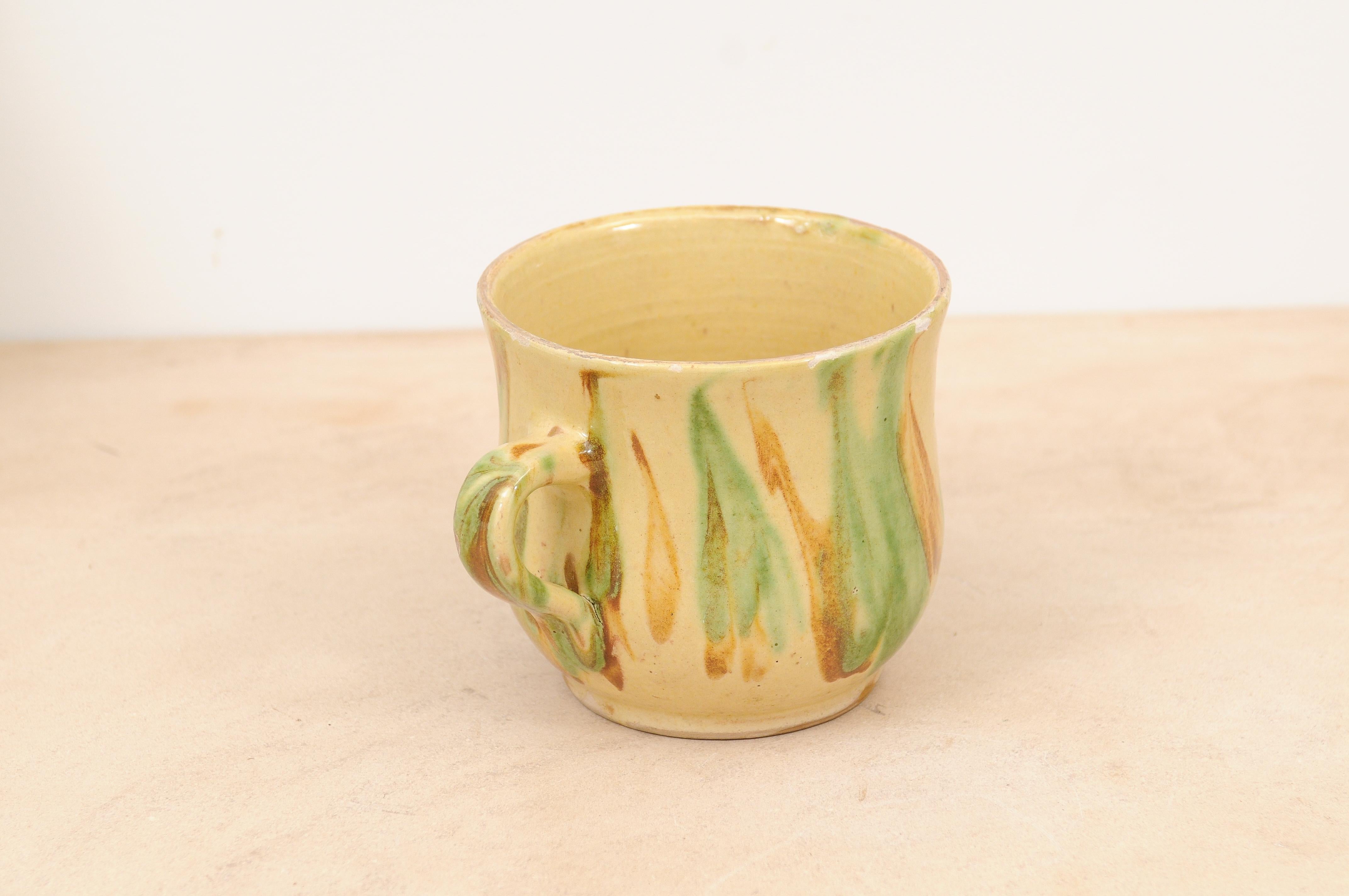 Rustic French 19th Century Pottery Mug with Yellow, Green and Rust Glaze In Good Condition For Sale In Atlanta, GA