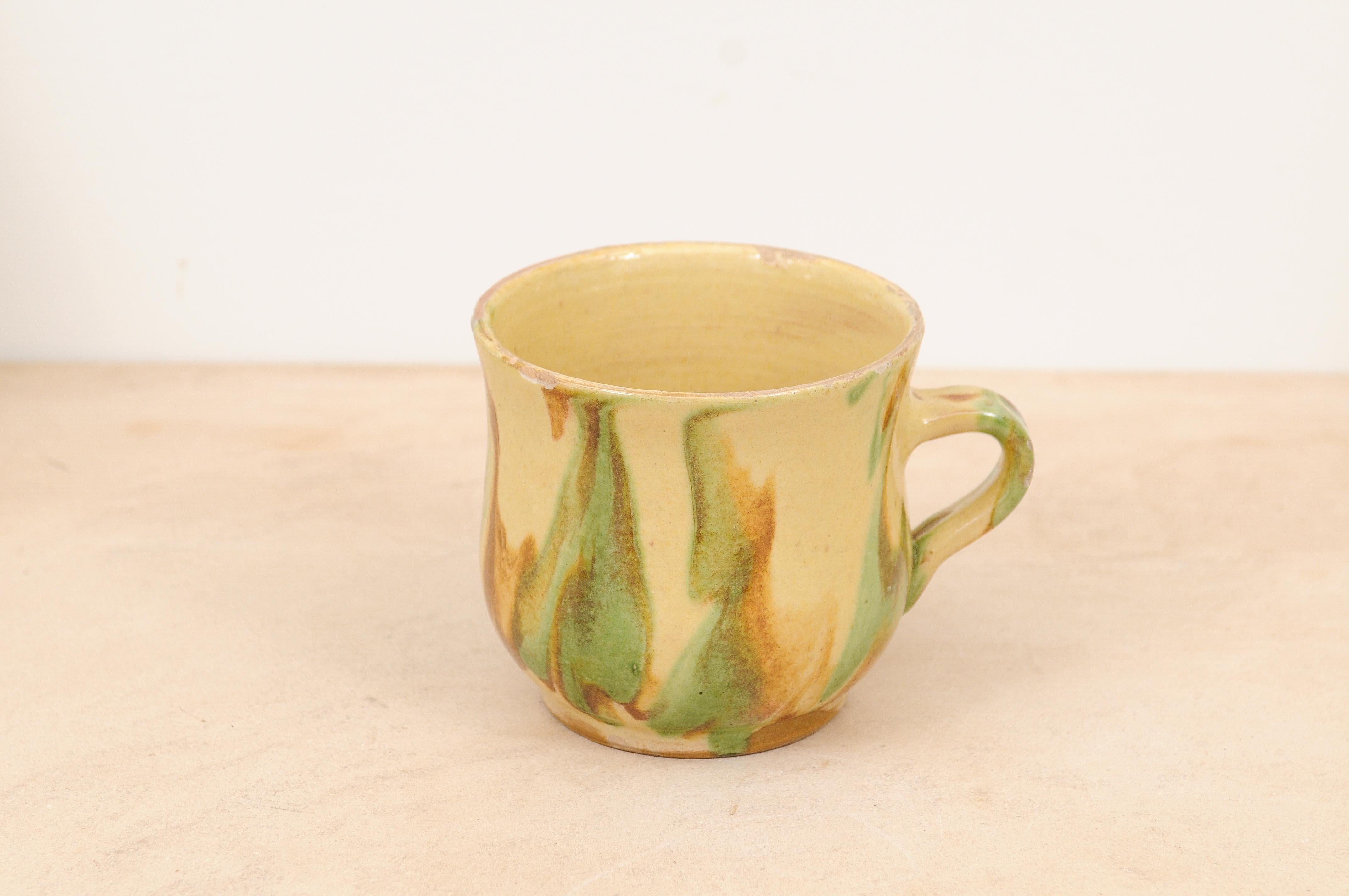 Rustic French 19th Century Pottery Mug with Yellow, Green and Rust Glaze For Sale 3